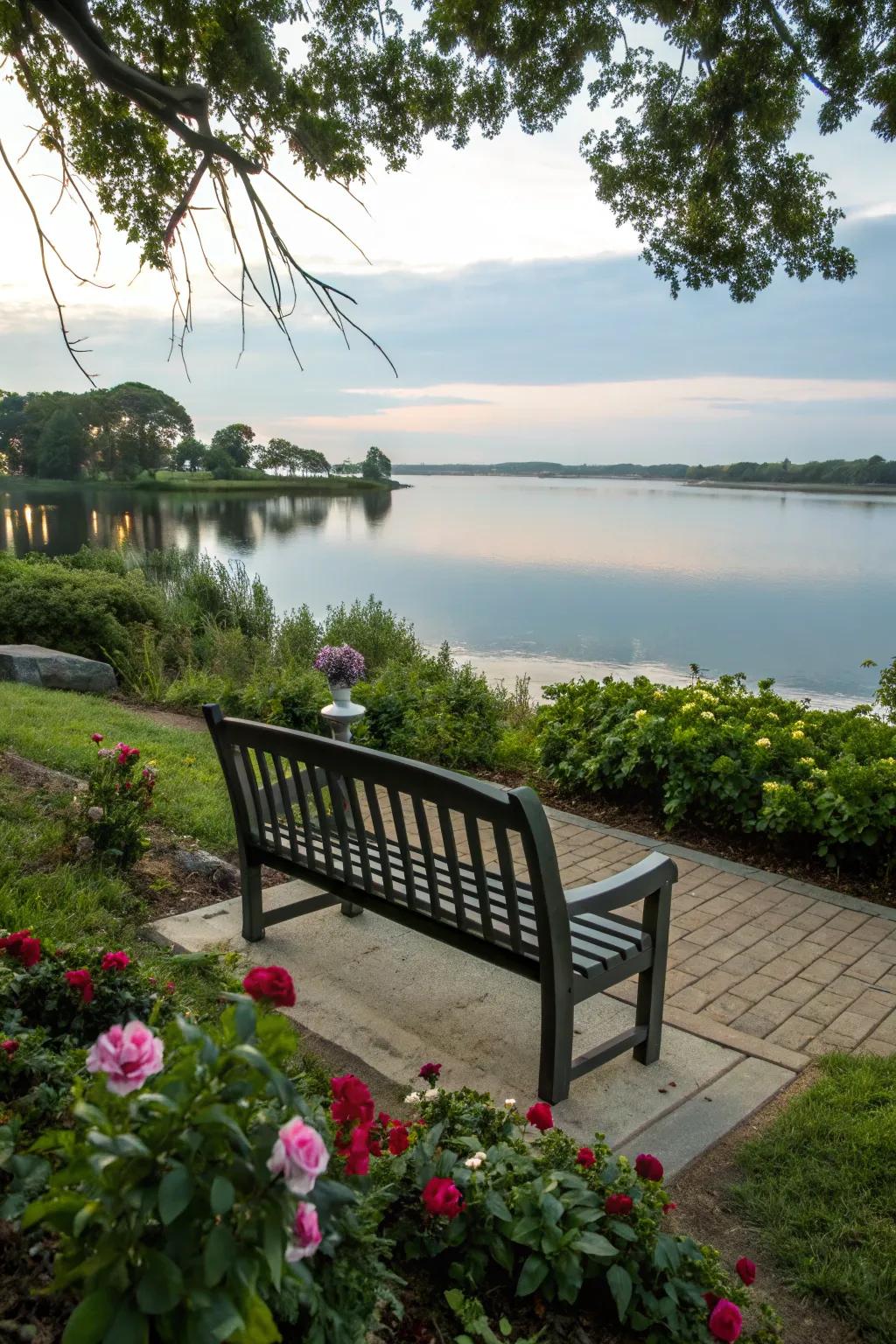A memorial bench with a tranquil waterfront view enhancing peace and reflection.