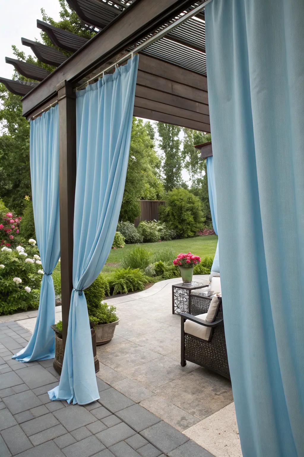 Blue curtains offer privacy and elegance.