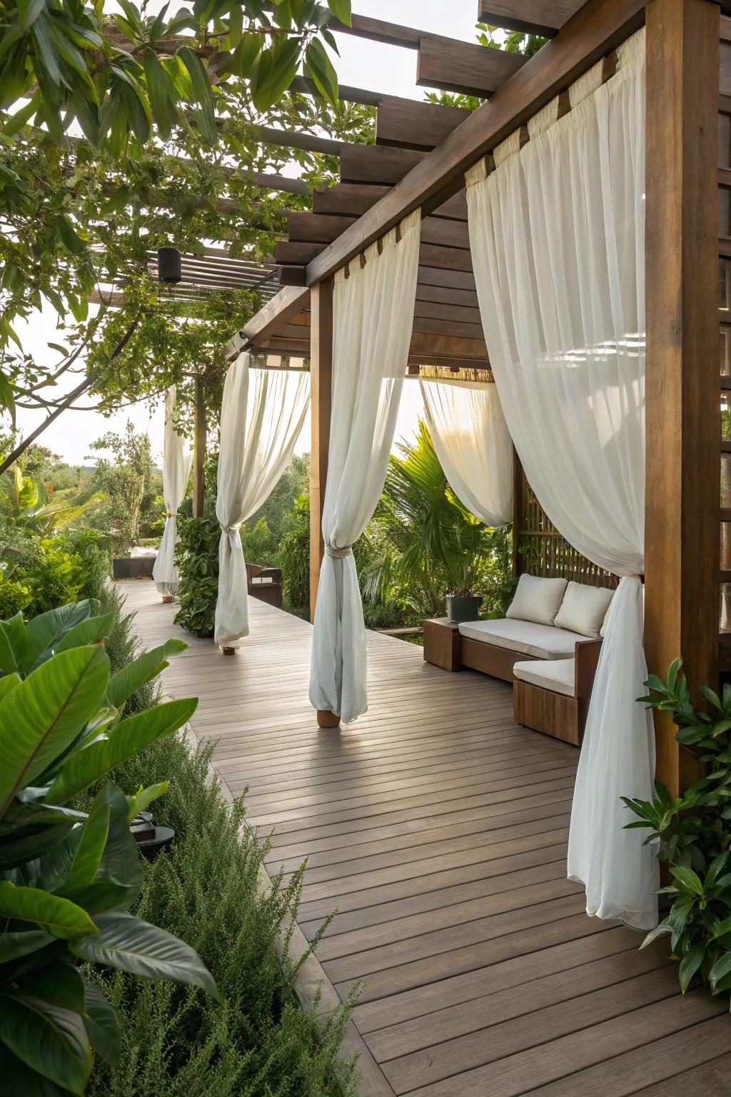 Create a serene escape with a pergola adorned with elegant drapes.