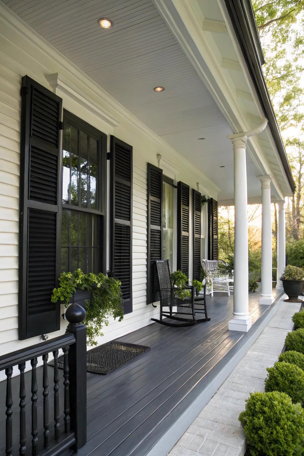 Black shutters add a classic touch to the porch.