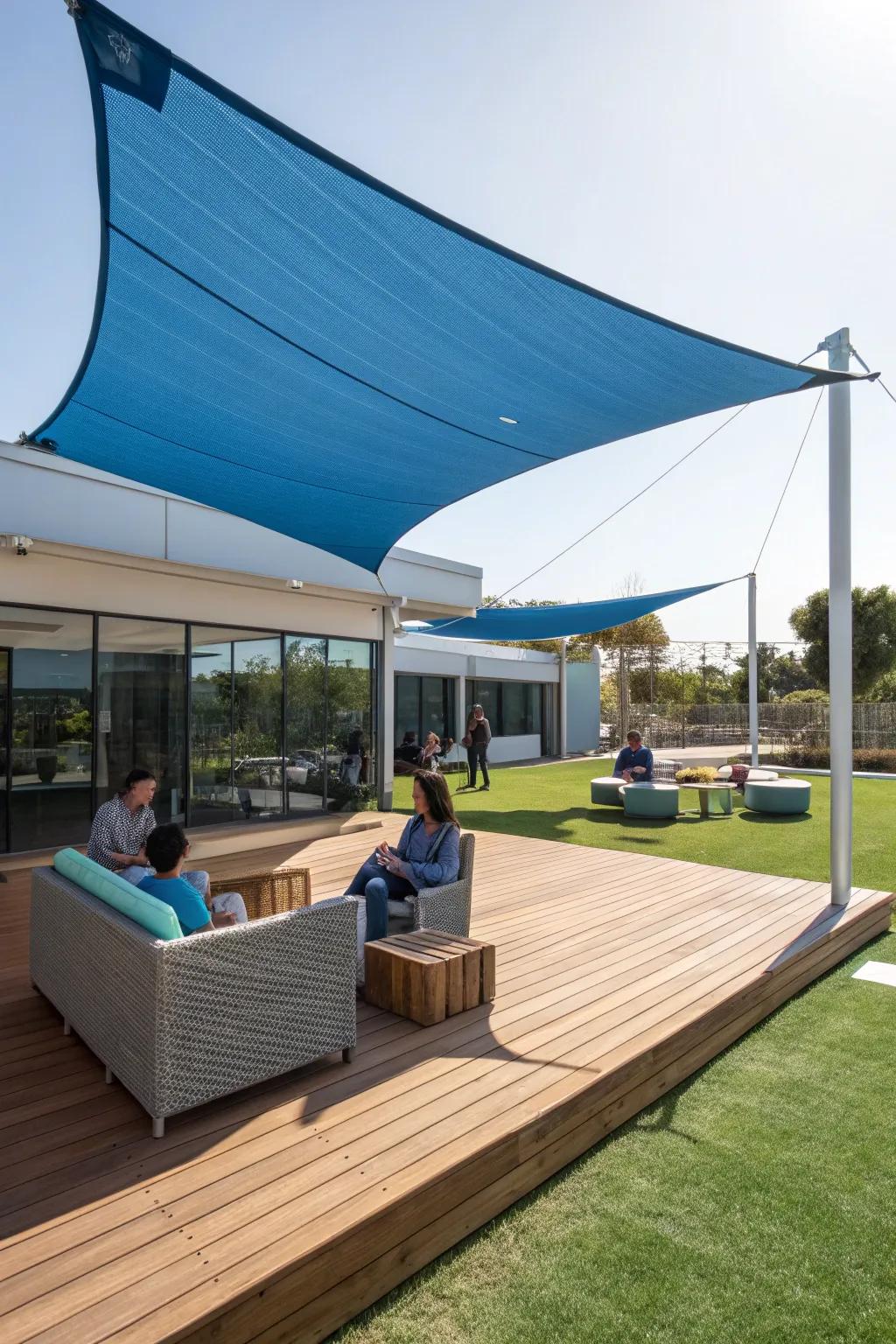 Stay cool with a modern shade sail on your deck.