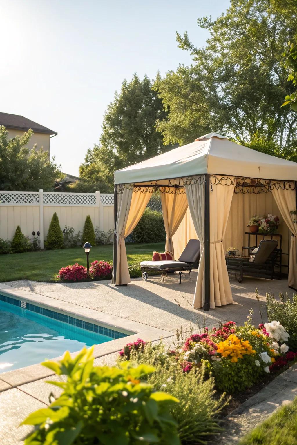 A portable canvas cabana providing shade and privacy by the pool.