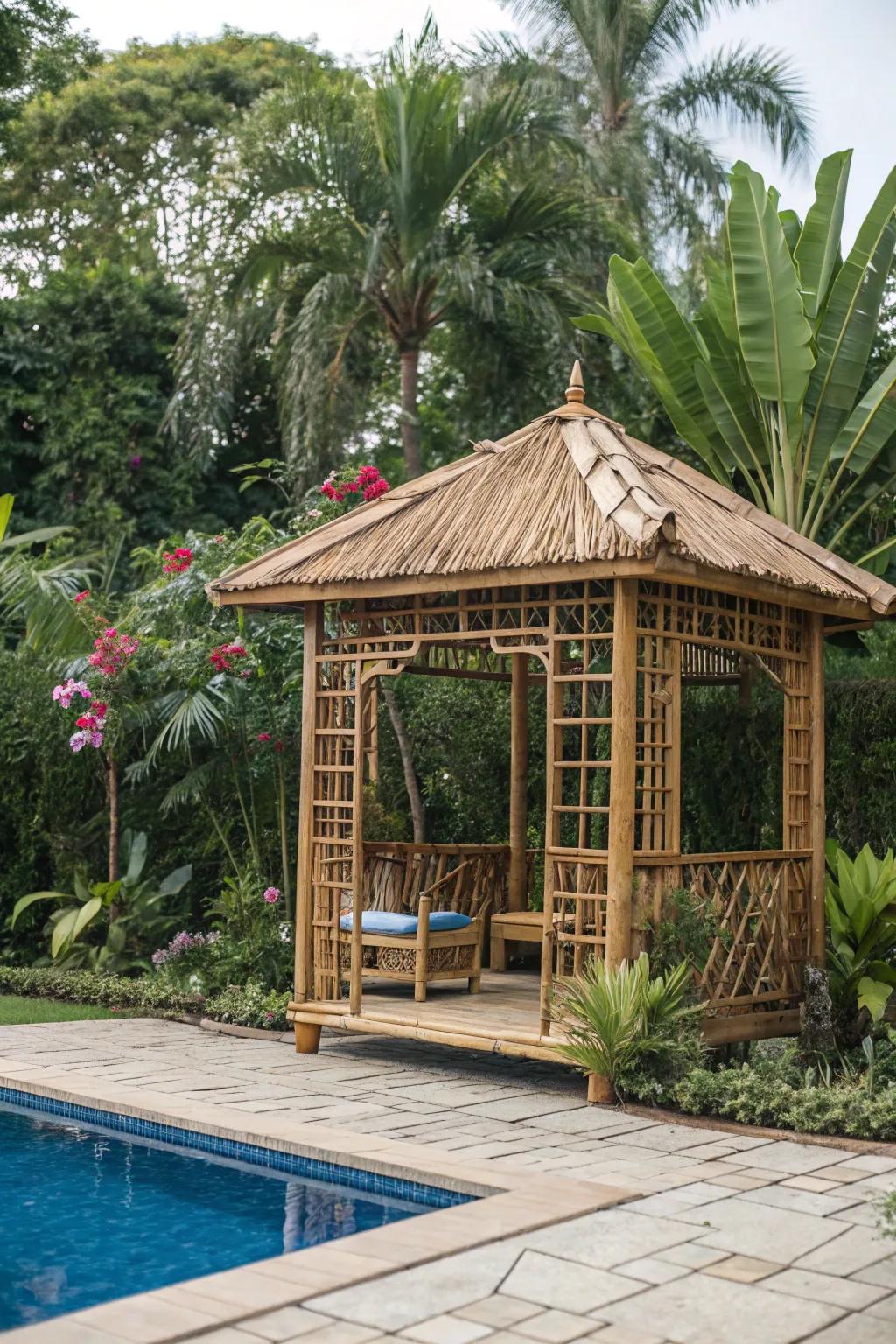 A tropical retreat gazebo with lush greenery by the pool.