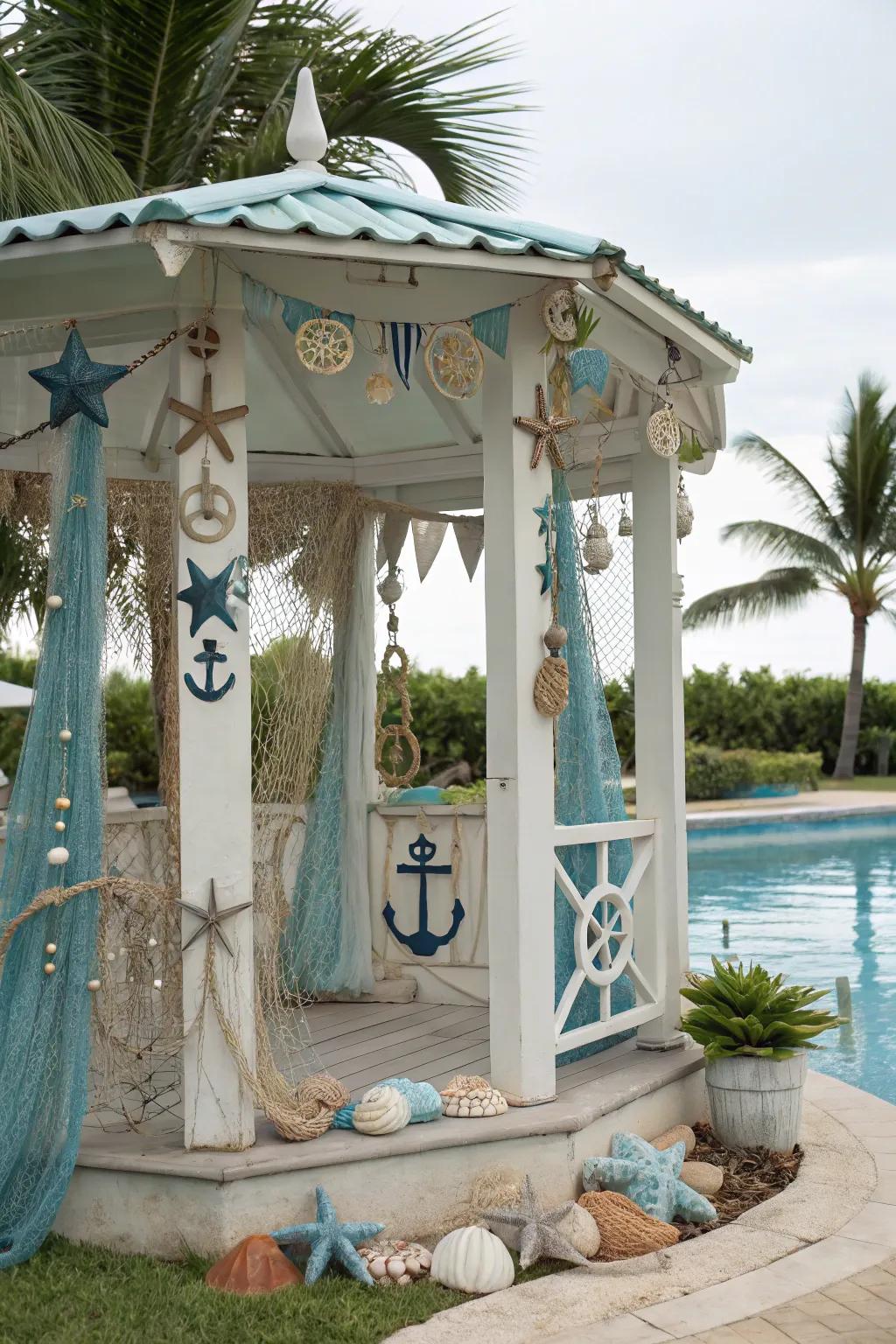 Relaxing coastal gazebo with nautical accents by the pool.