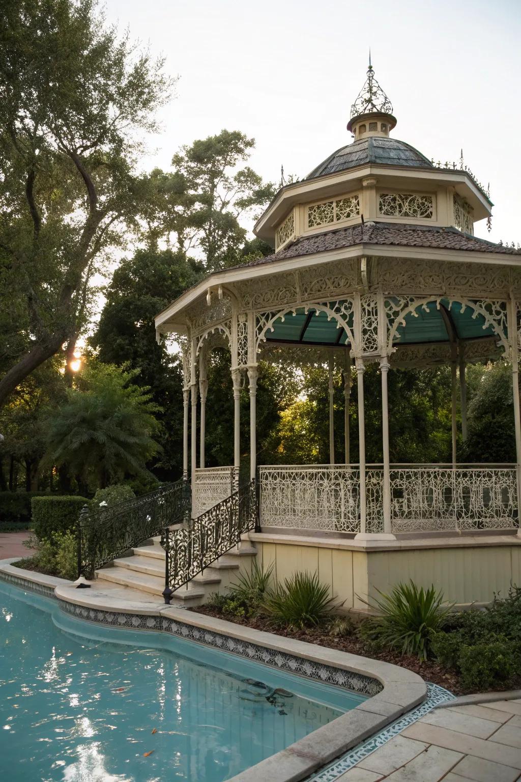 A sophisticated Victorian-style gazebo adds vintage charm to the pool.