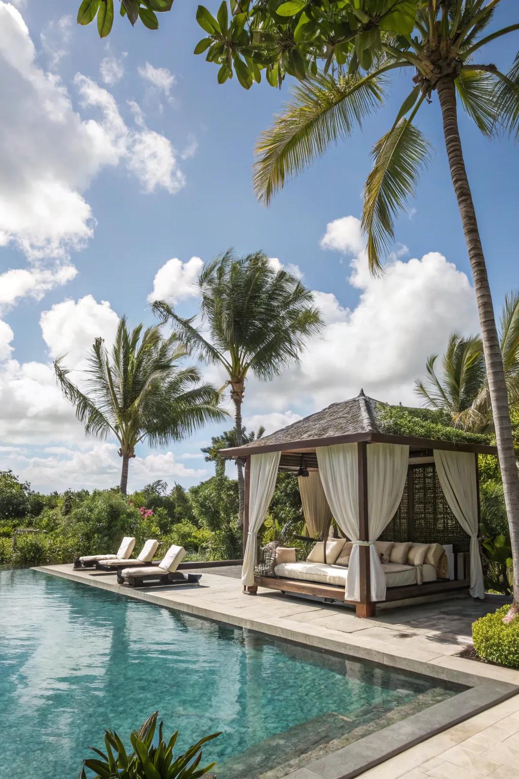 A tropical pool with a luxurious cabana.