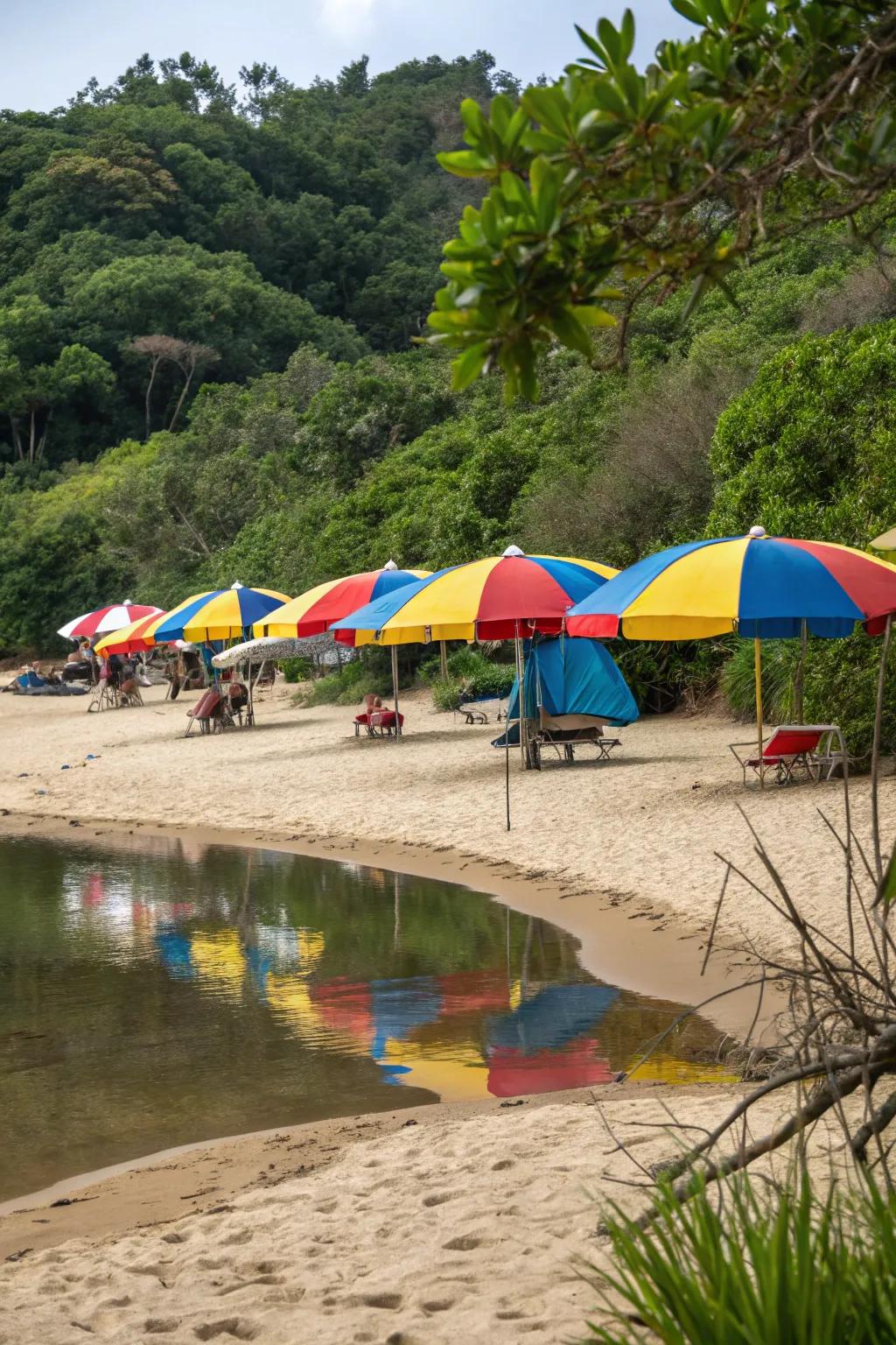 Colorful umbrellas add vibrancy and practicality to your pond beach.
