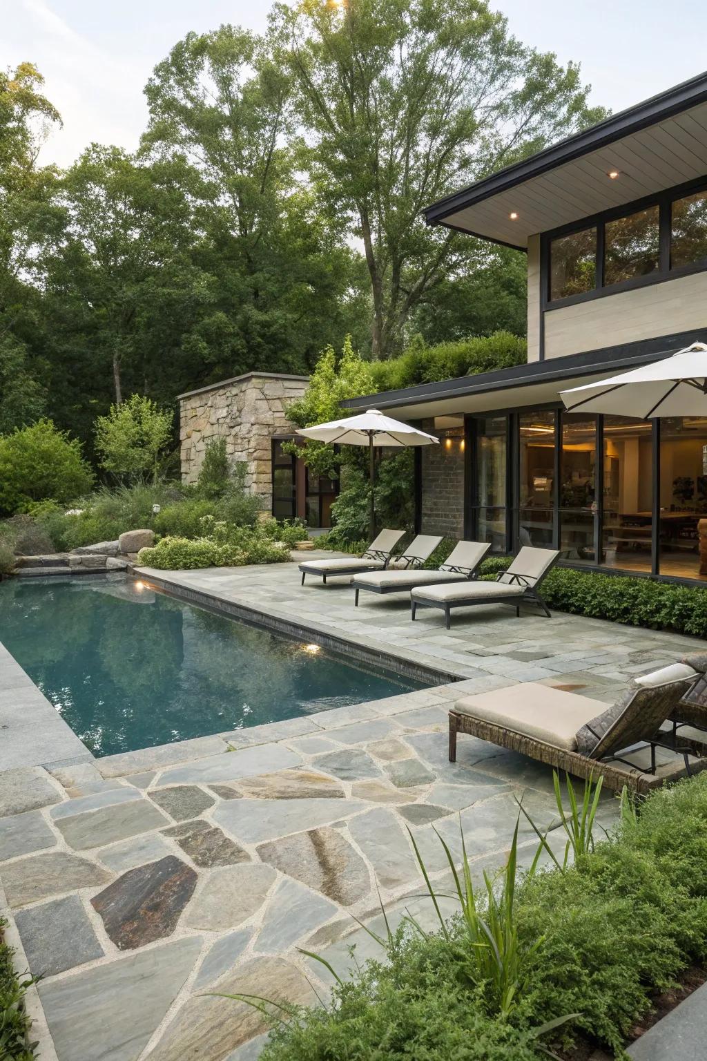 A pool deck featuring elegant stone flooring for a sophisticated touch.