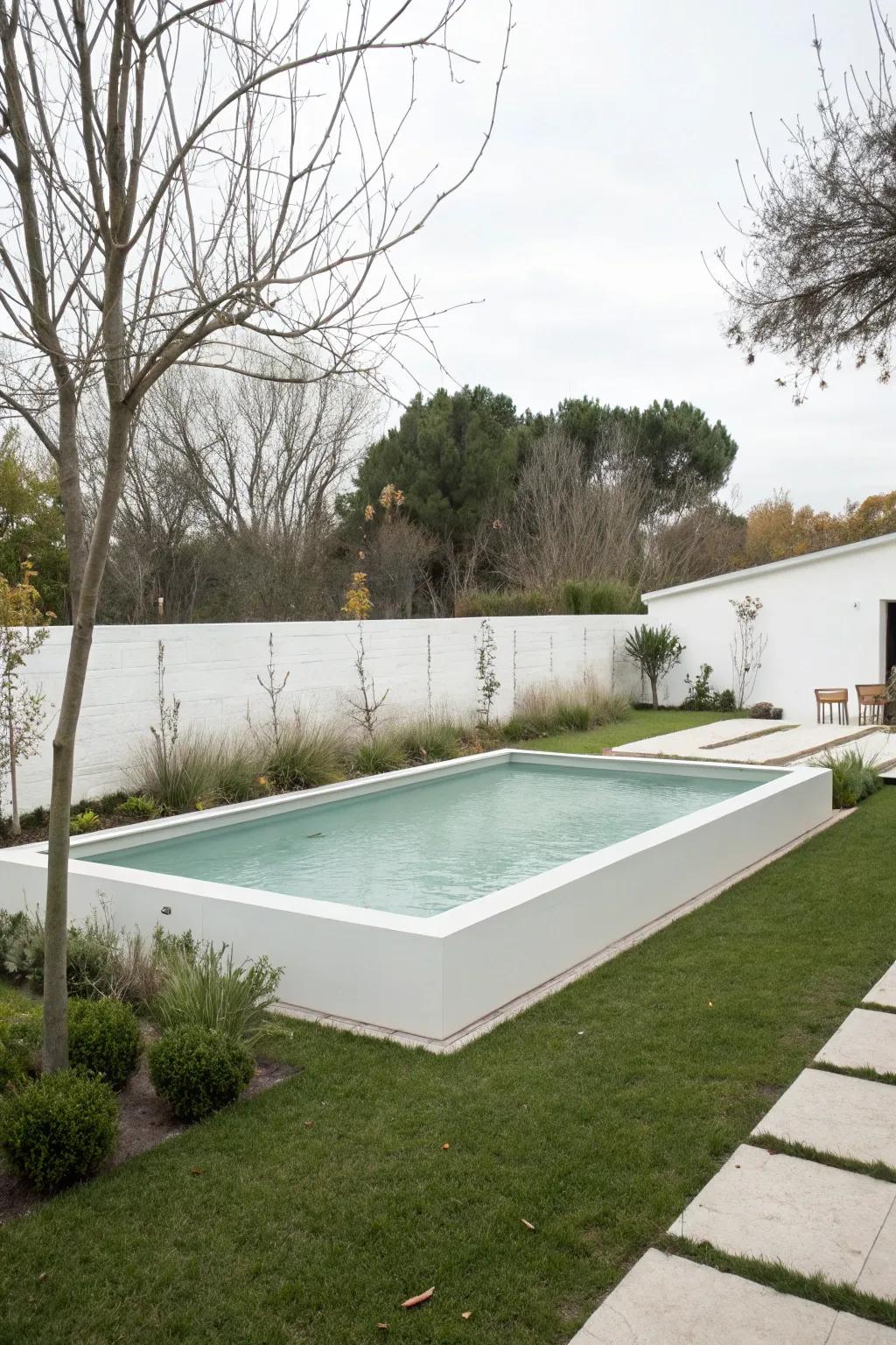 A minimalist white pool offers serenity and simplicity.