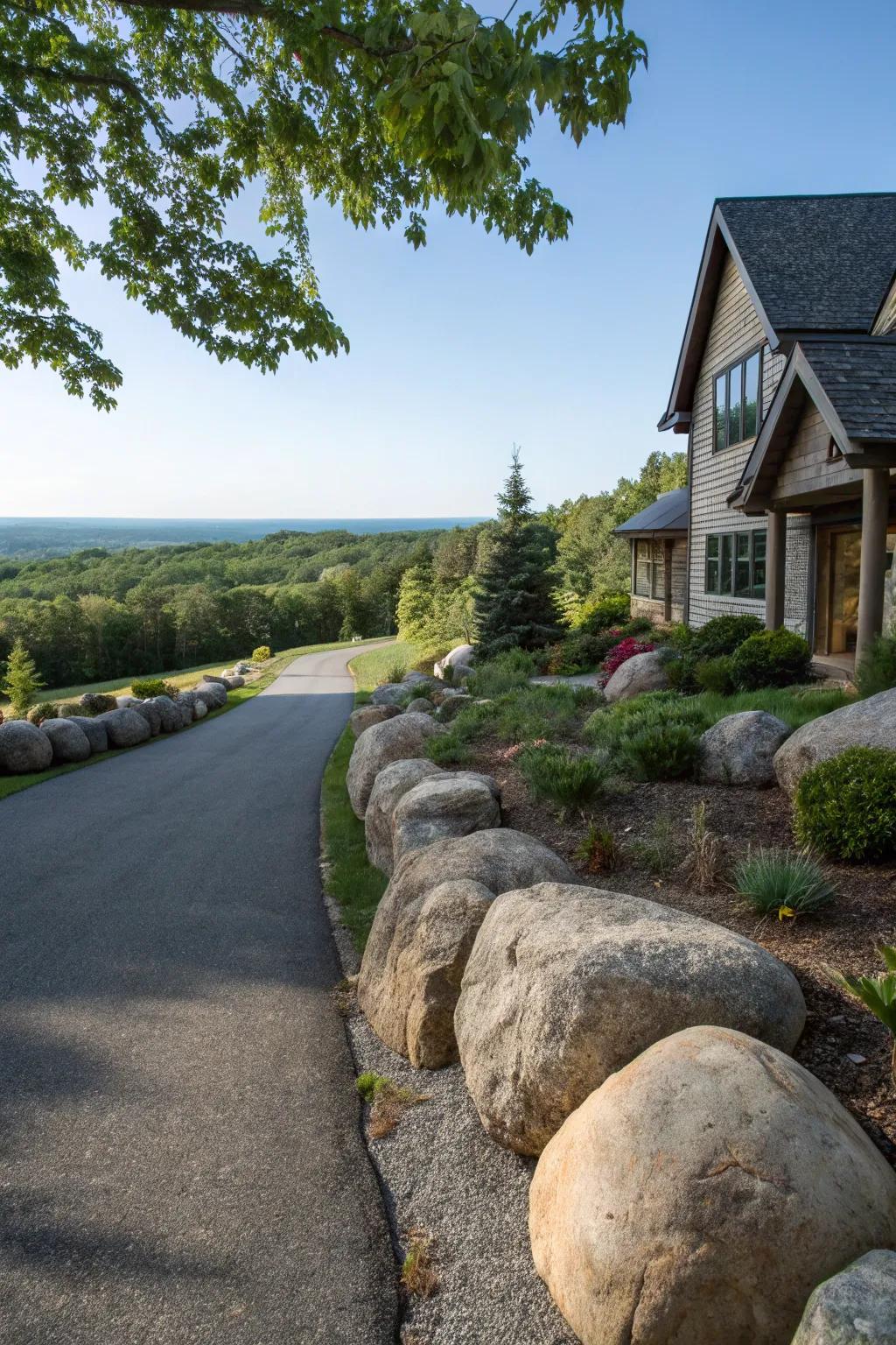 Boulders add a bold and natural touch to driveway edges.