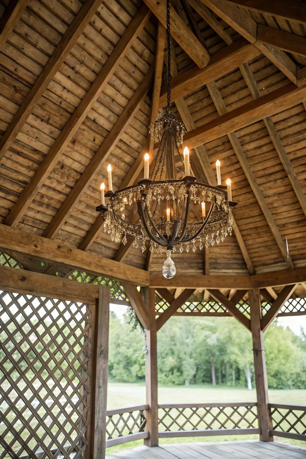 A chandelier adds unexpected elegance to the corn crib gazebo.