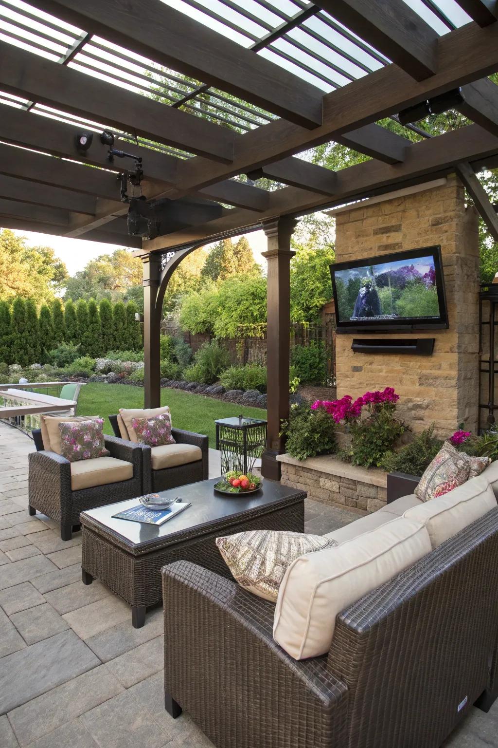 A pergola provides perfect protection for your patio TV setup.