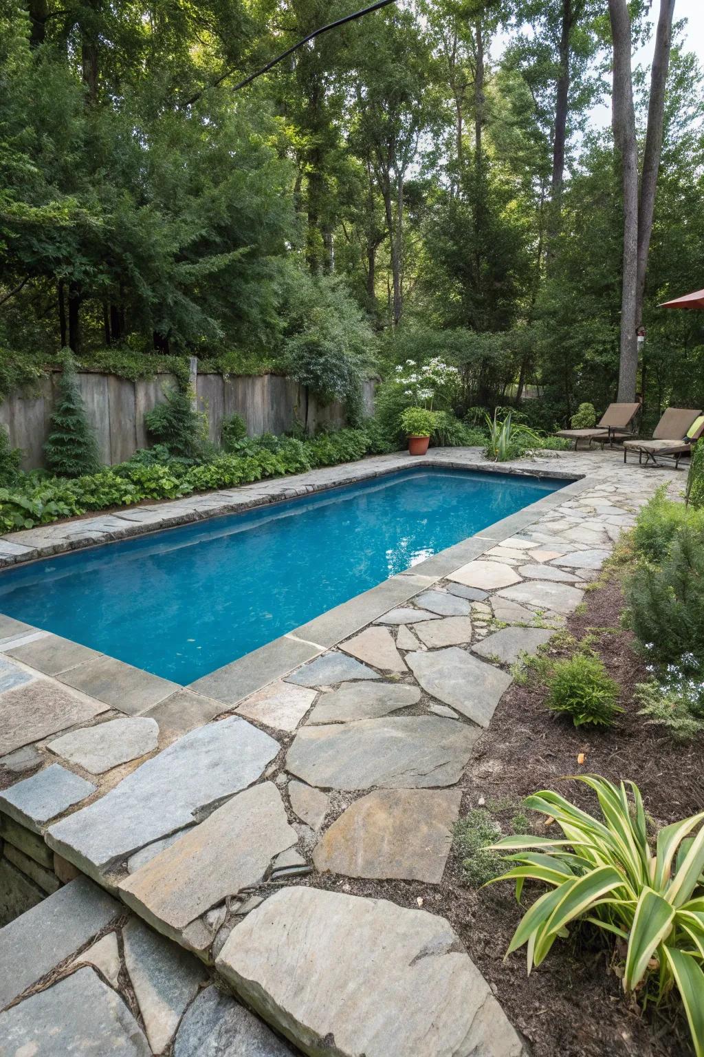 Rustic natural stone decking enhances this pool's beauty.