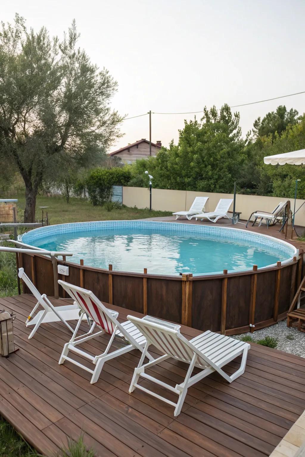 An elegant above-ground pool with decking for a stylish outdoor retreat.