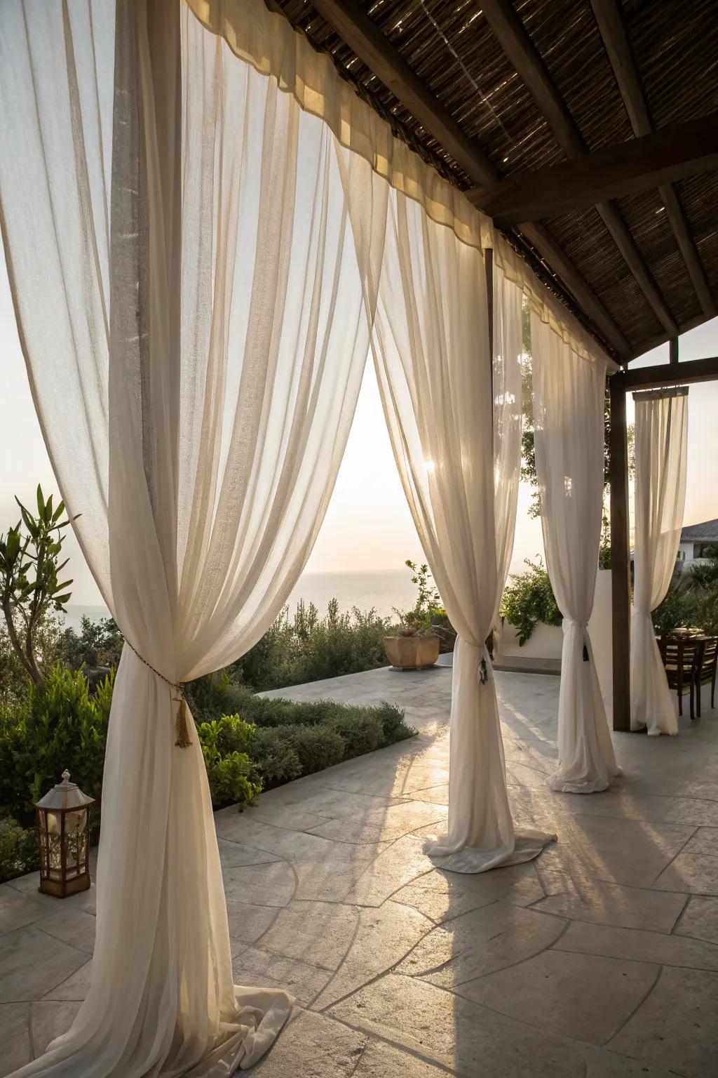 Sheer curtains provide an elegant and airy privacy option for patios.