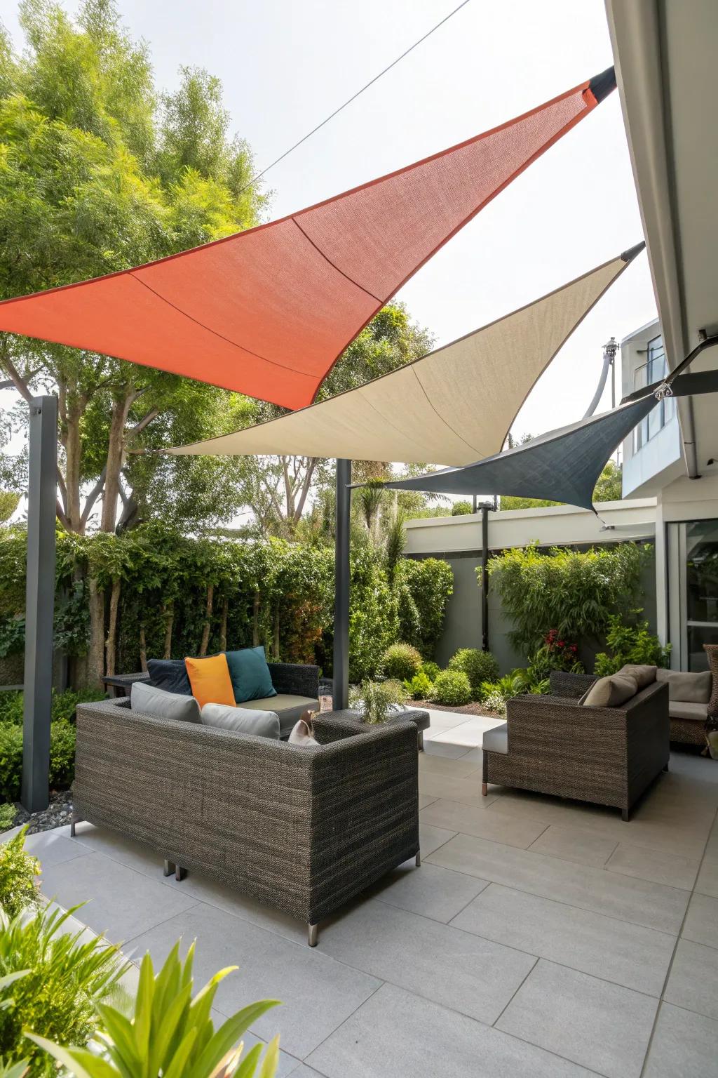 Shade sails offer a modern and chic privacy solution.