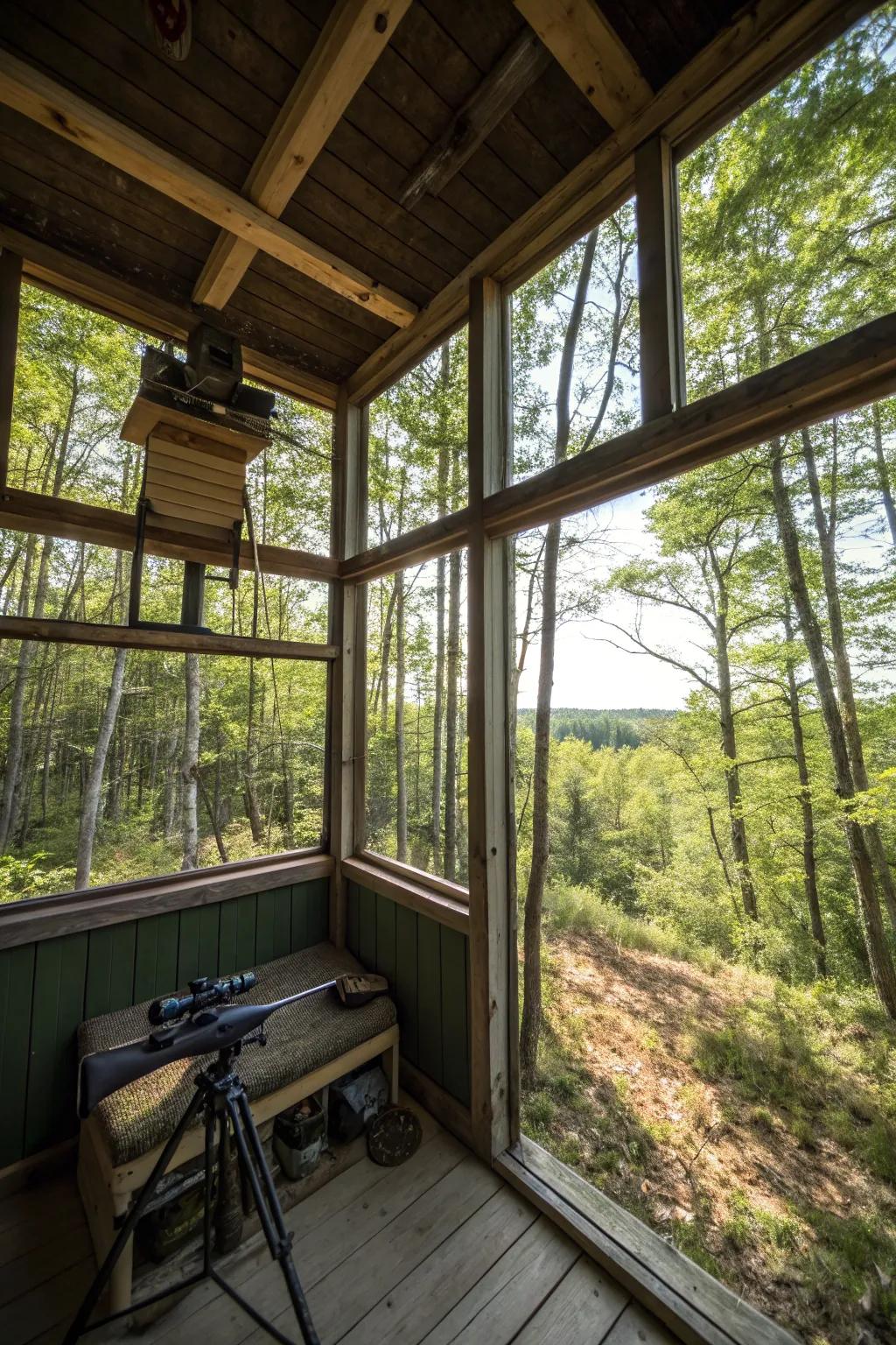 Large windows provide a stunning view of the surrounding forest.