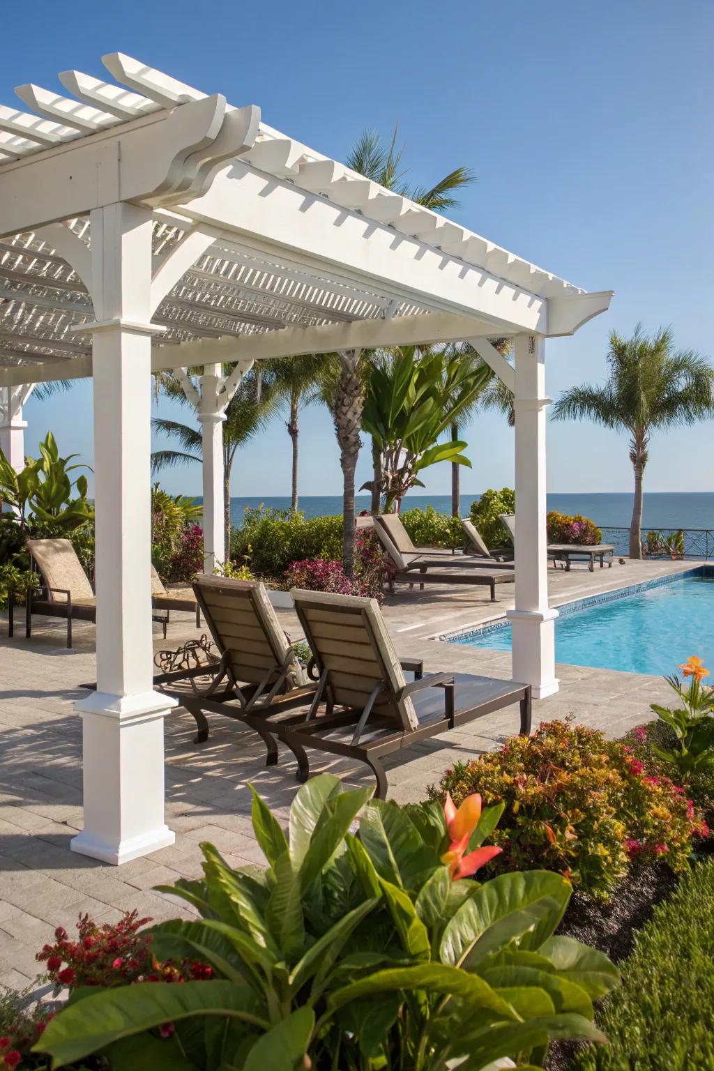 Create a serene poolside retreat with a stylish vinyl pergola.