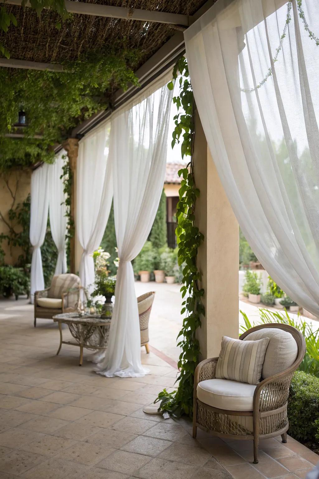 Sheer curtains providing privacy and style to the patio.