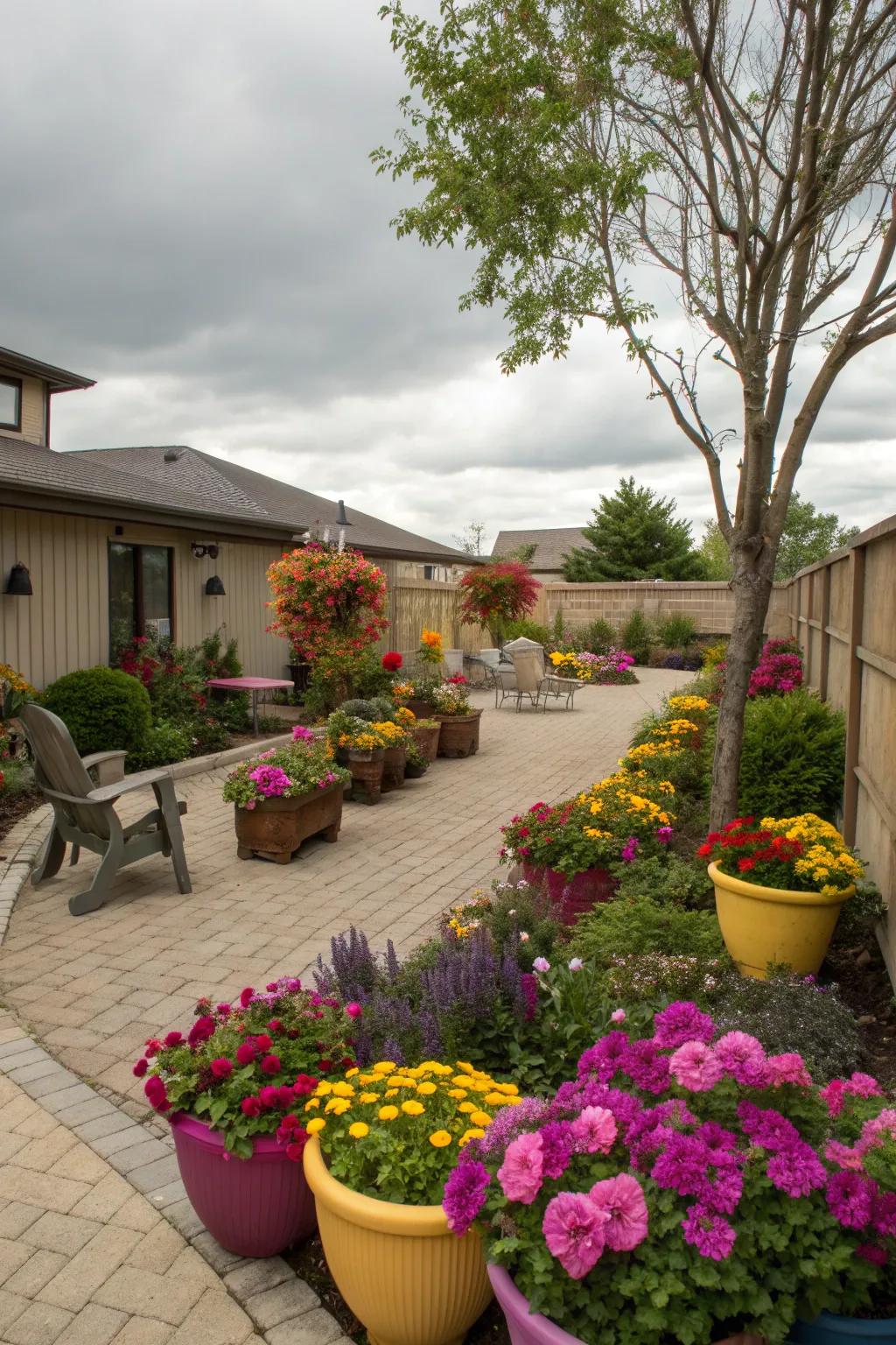A lively courtyard with colorful planters and flowers.