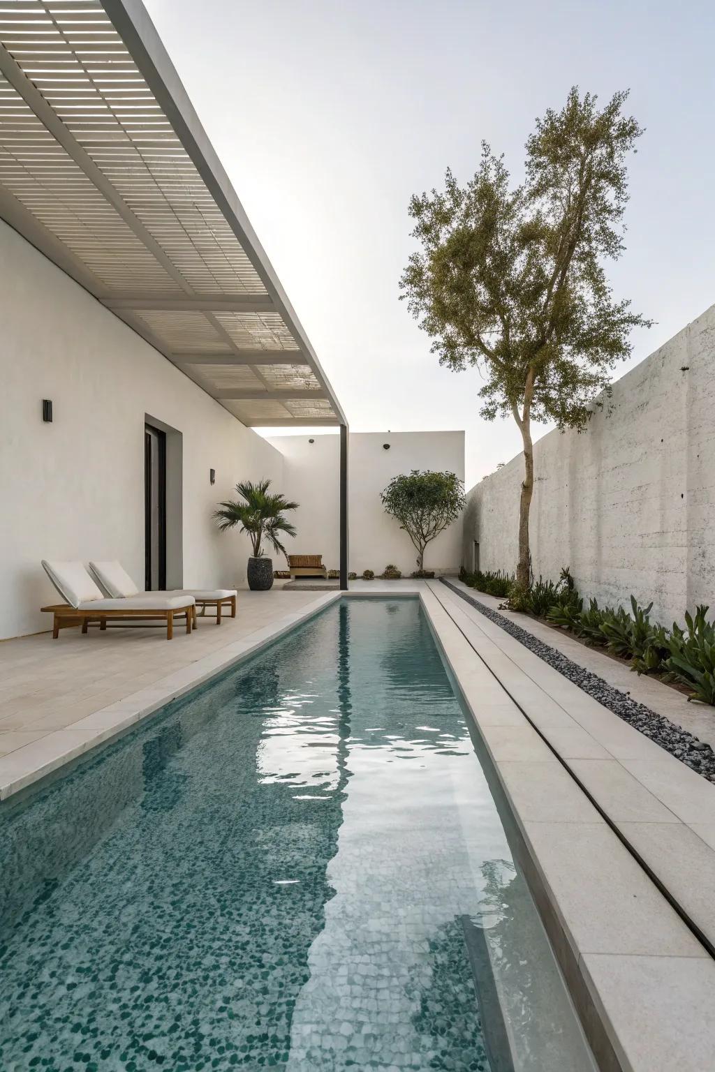 A minimalist lap pool with sleek design elements for a calm atmosphere.