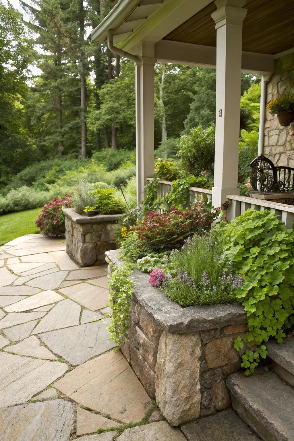 A lush flagstone porch featuring built-in planters with greenery.