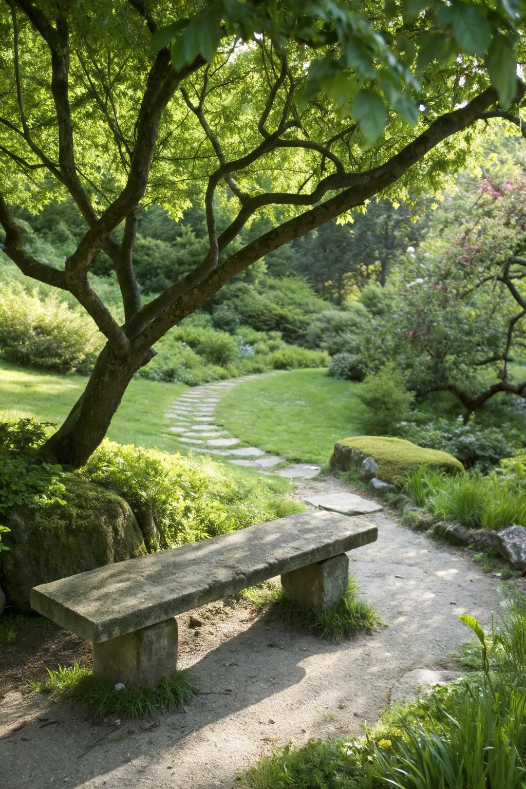 A stone bench offering rustic seating in a meditation garden.
