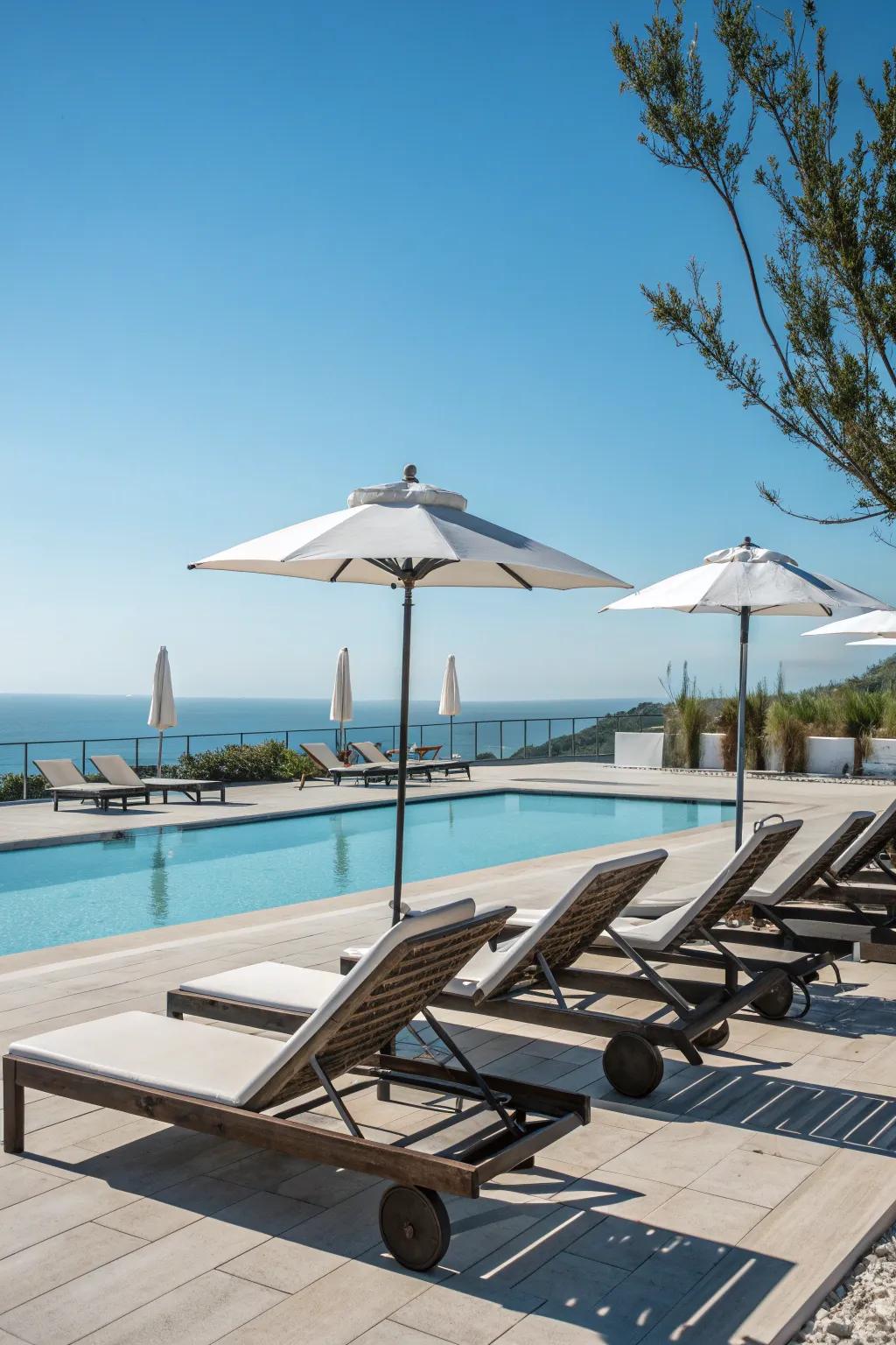 Bask in the sun with stylish chaise lounges perfect for poolside relaxation.