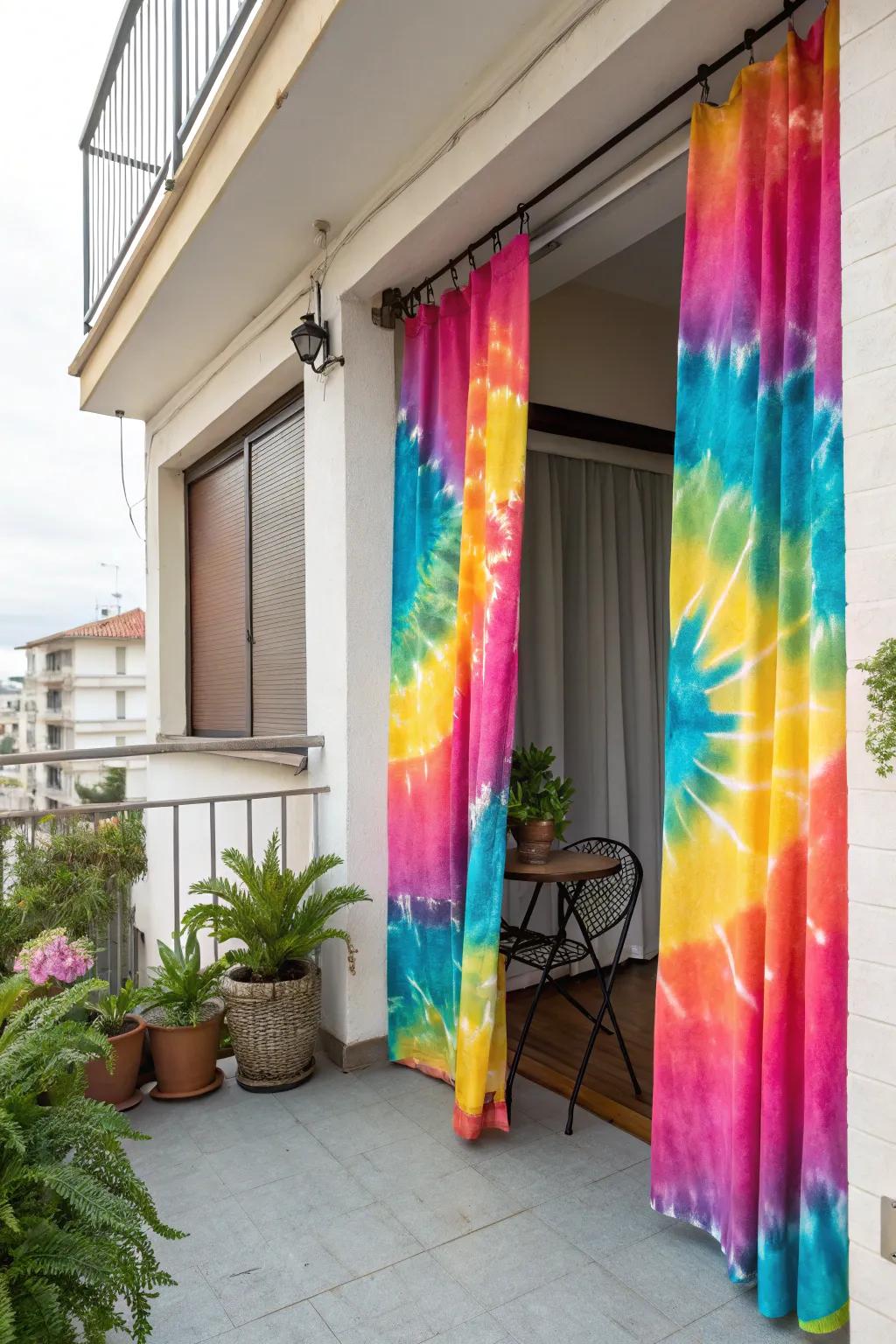 Tie-dye curtains offer a unique, colorful touch to your balcony.