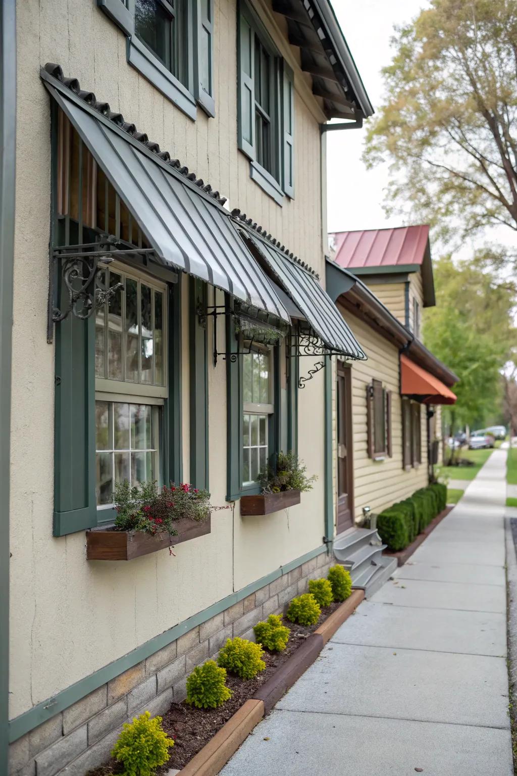 House windows featuring small, stylish metal awnings.