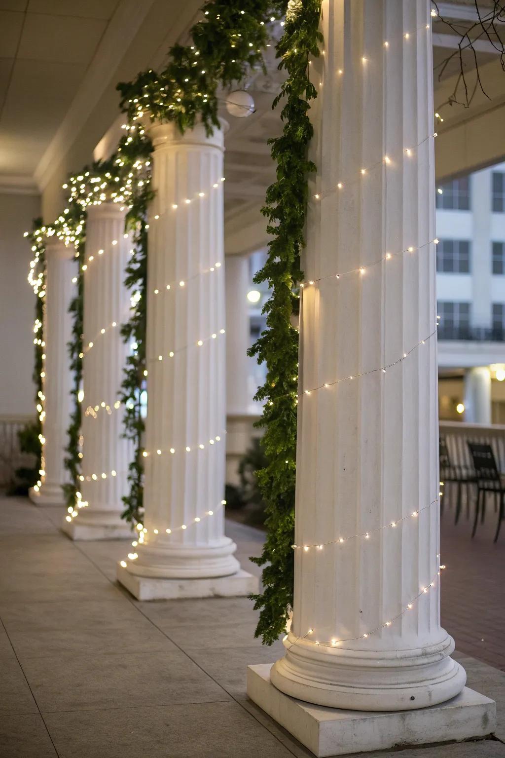 Minimalist columns with elegant white lights and greenery.