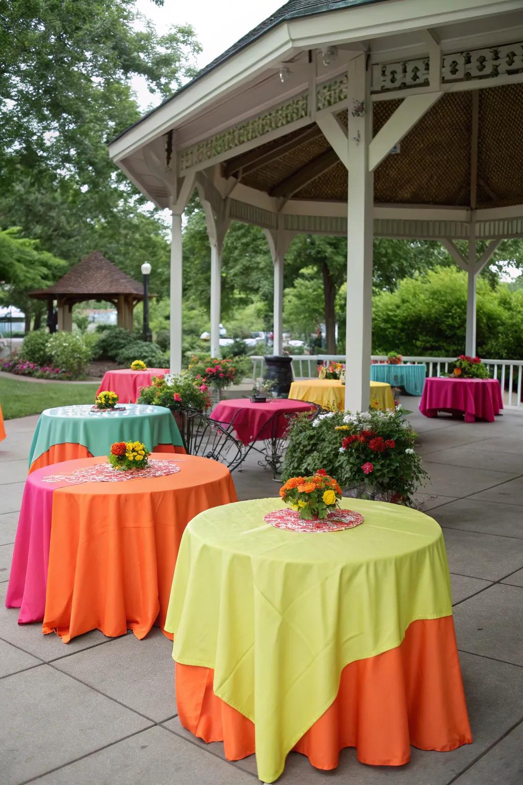Themed tablecloths bring color and unity to your pavilion setup.