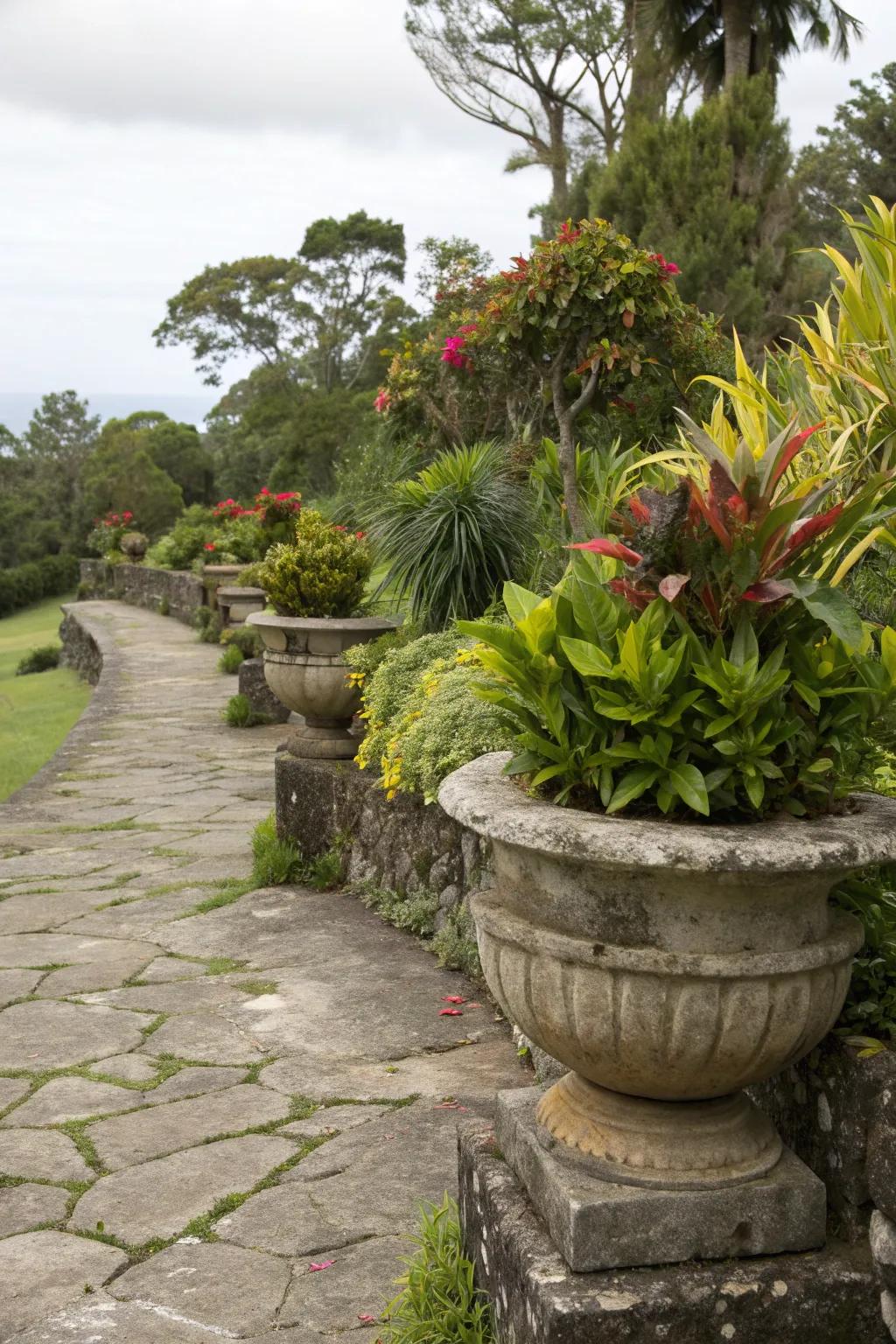 Stone planters add a natural touch to lush arrangements.