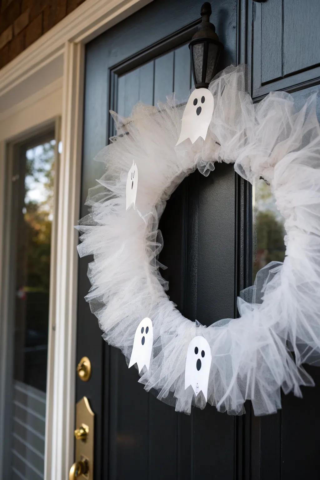 A ghostly white wreath that adds a touch of whimsy to Halloween decor.