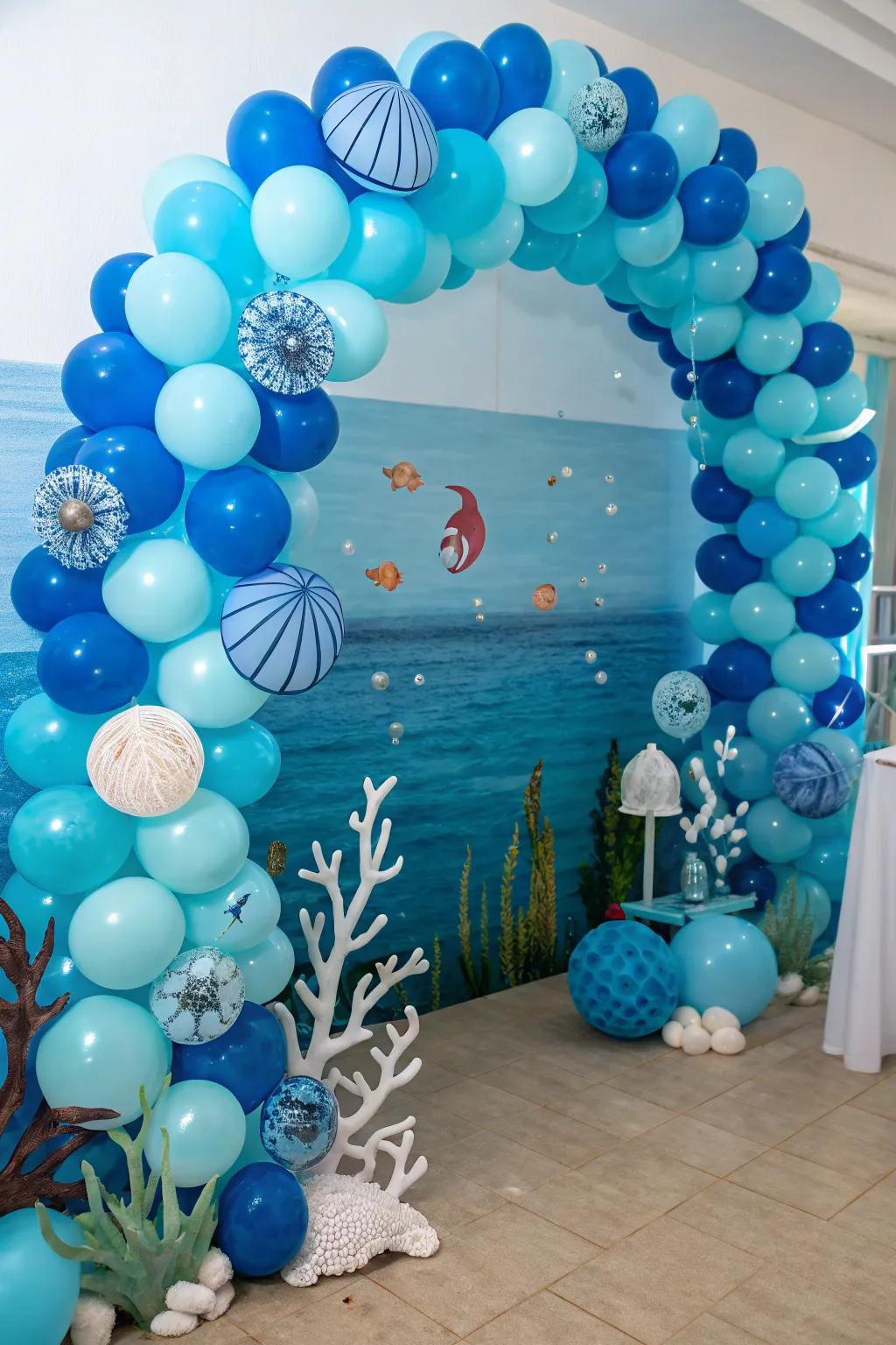 A whimsical under-the-sea balloon arch.