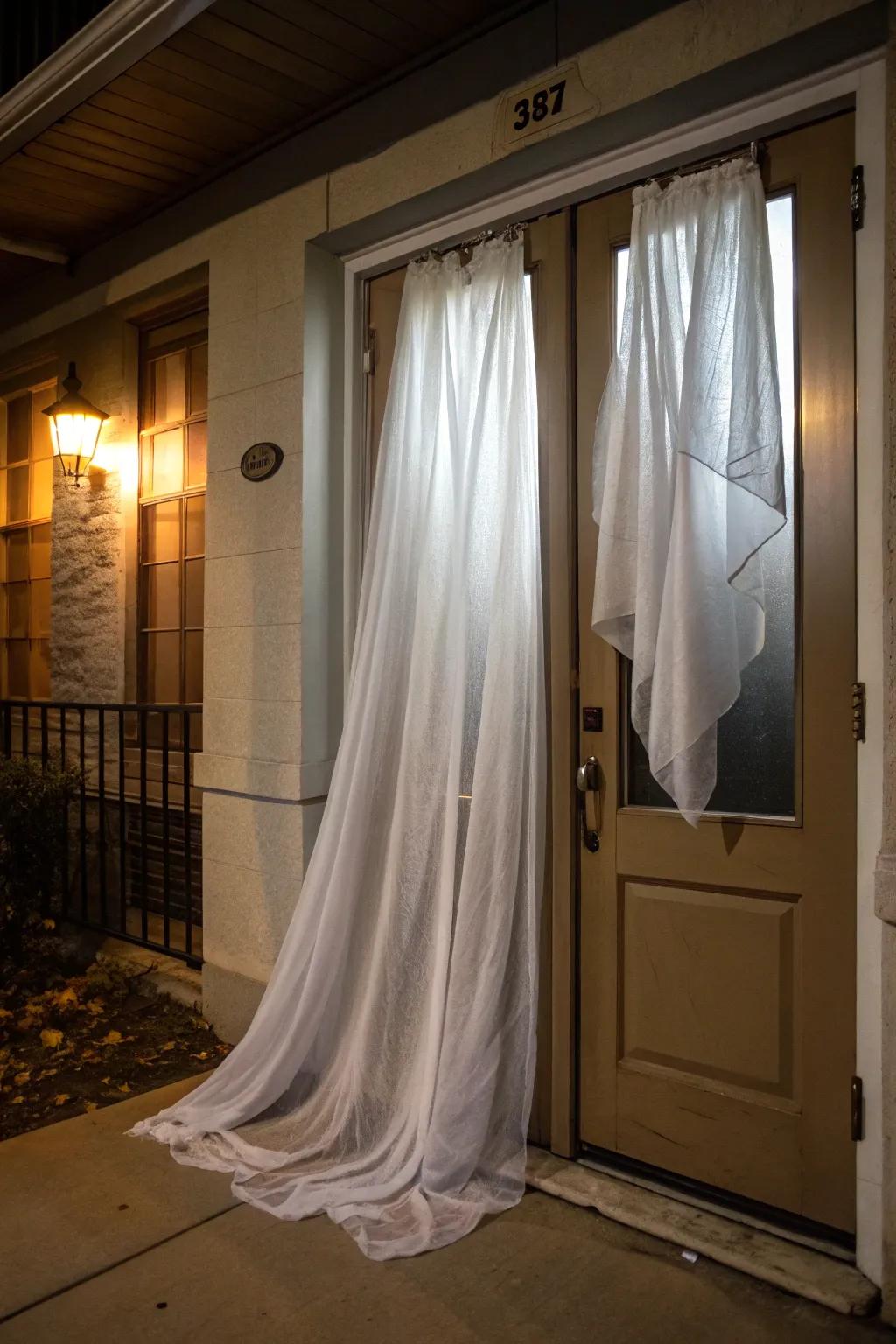 Ghostly curtains lend an ethereal look to your door.