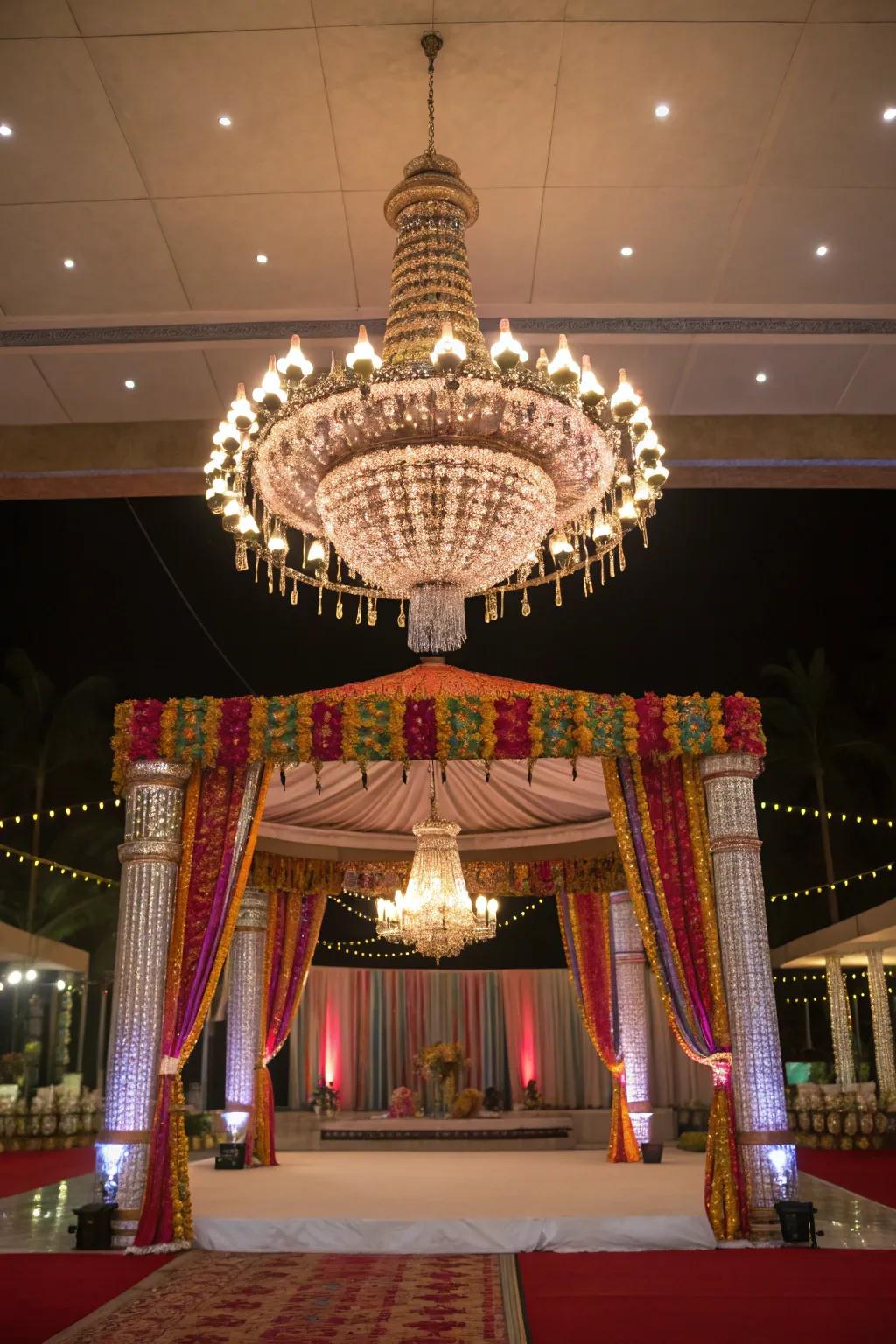 Chandelier charm adding a sparkle to this elegant mandap.