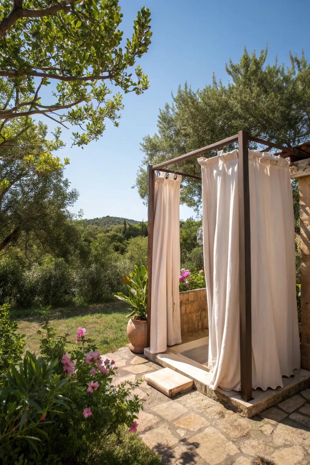 Enhance privacy and style with elegant canvas curtains in your outdoor shower.