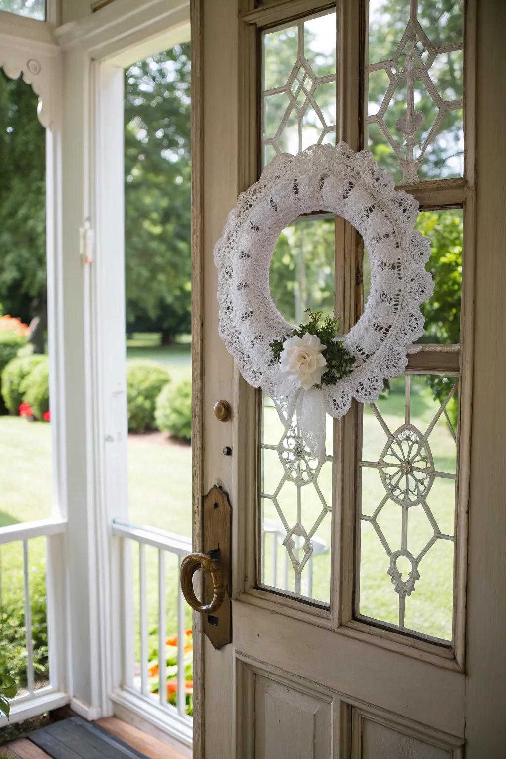 A nostalgic white doily wreath with vintage charm.