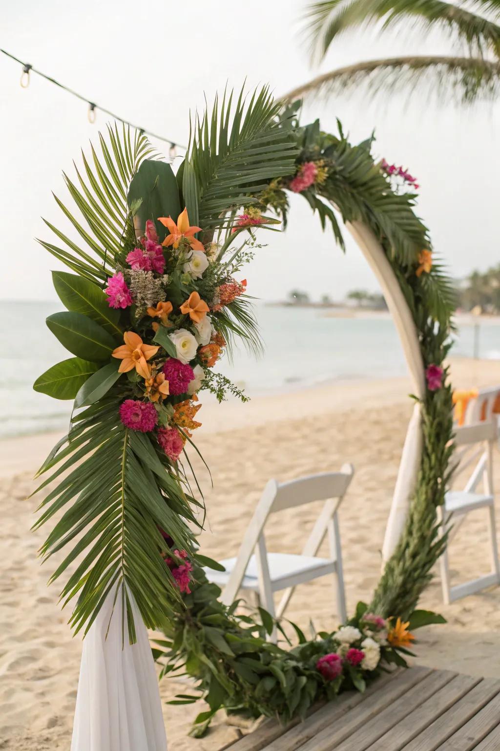 Tropical wreath with palm leaves and orchids for a beach wedding.