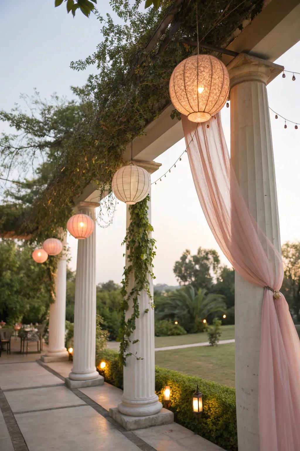 Whimsical boho-style lanterns hanging from columns