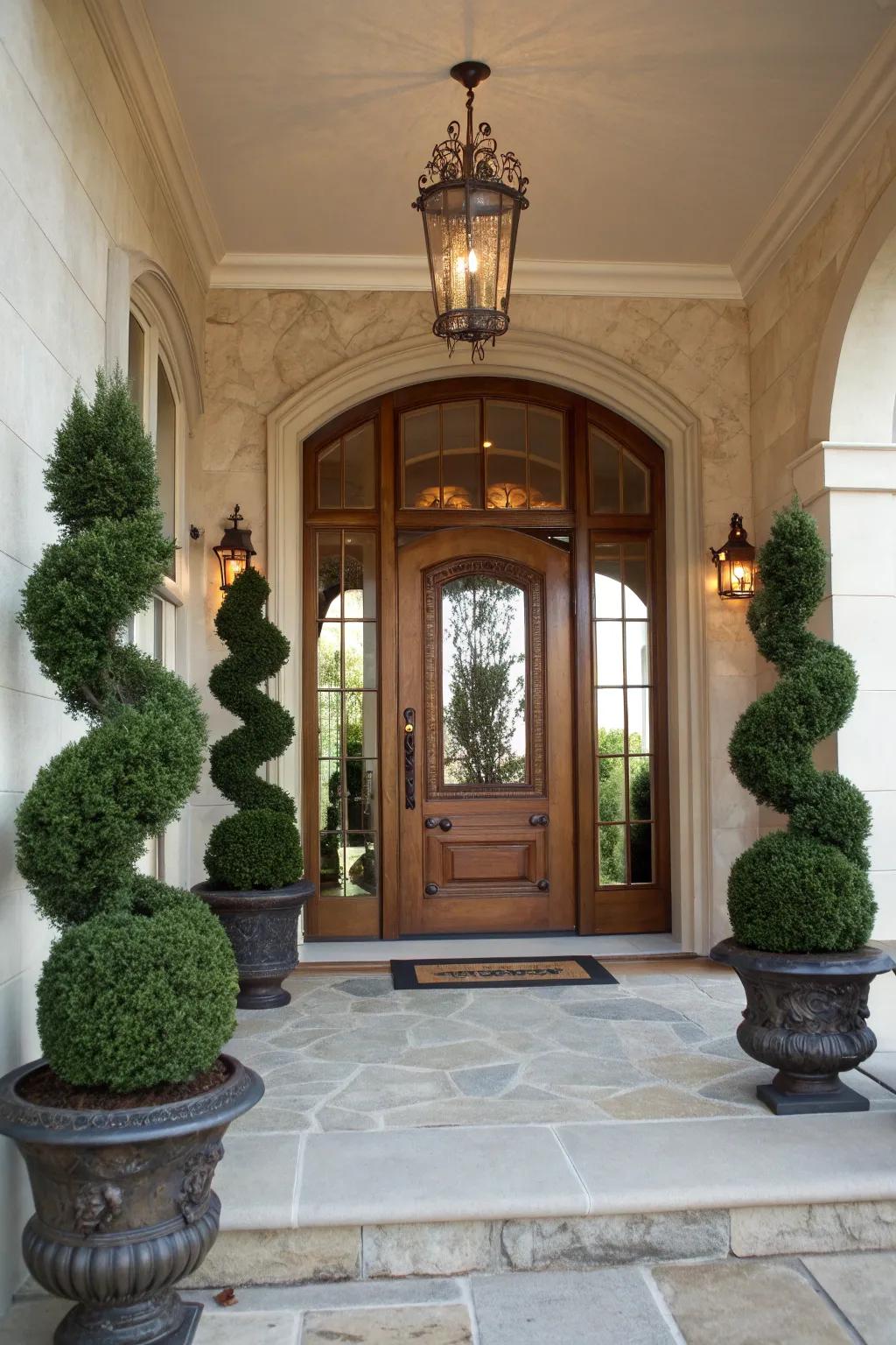 Symmetrical topiaries make a grand statement at your entrance.