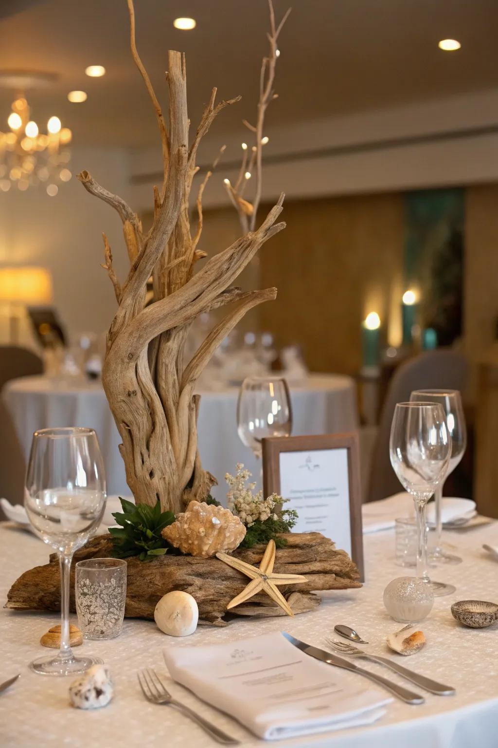 A driftwood centerpiece brings natural elegance to the table.