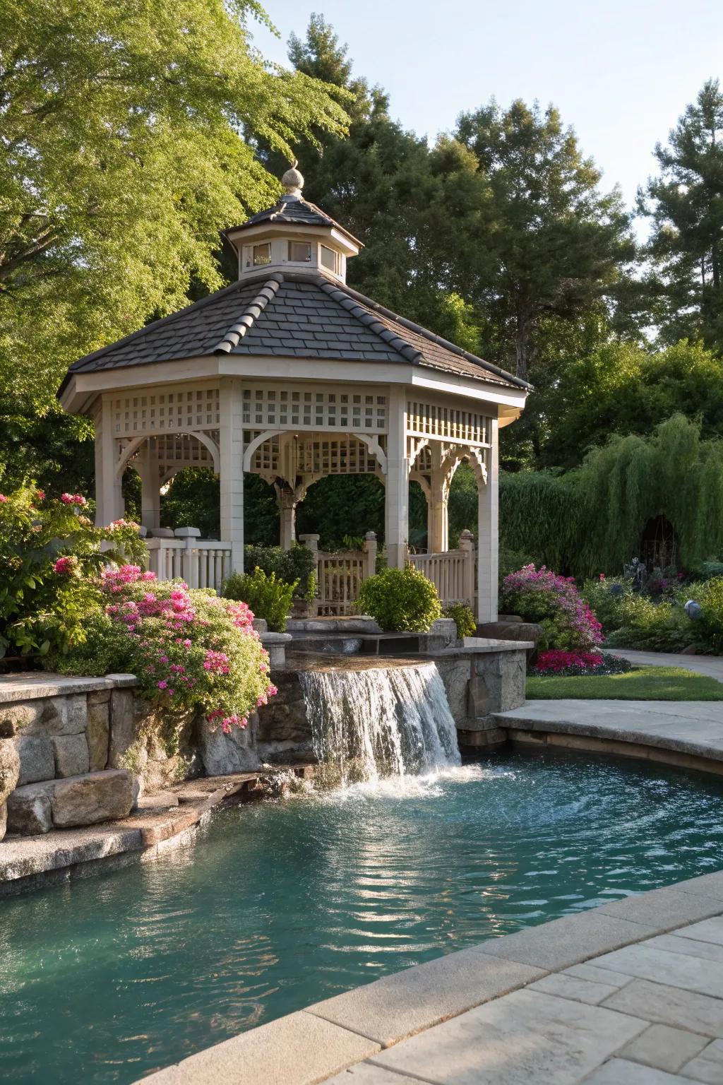 A gazebo with a waterfall feature adds tranquility to the poolside.