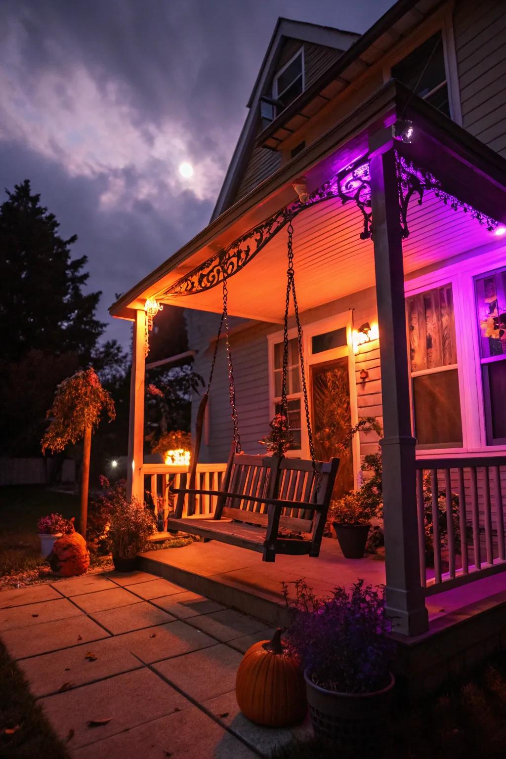 The stage is set for a spooky porch with orange and purple lights.