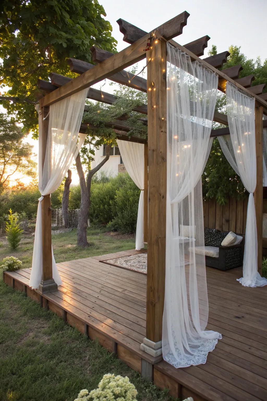 Elevate your outdoor space with a DIY pergola adorned with elegant mosquito netting, combining style and functionality.