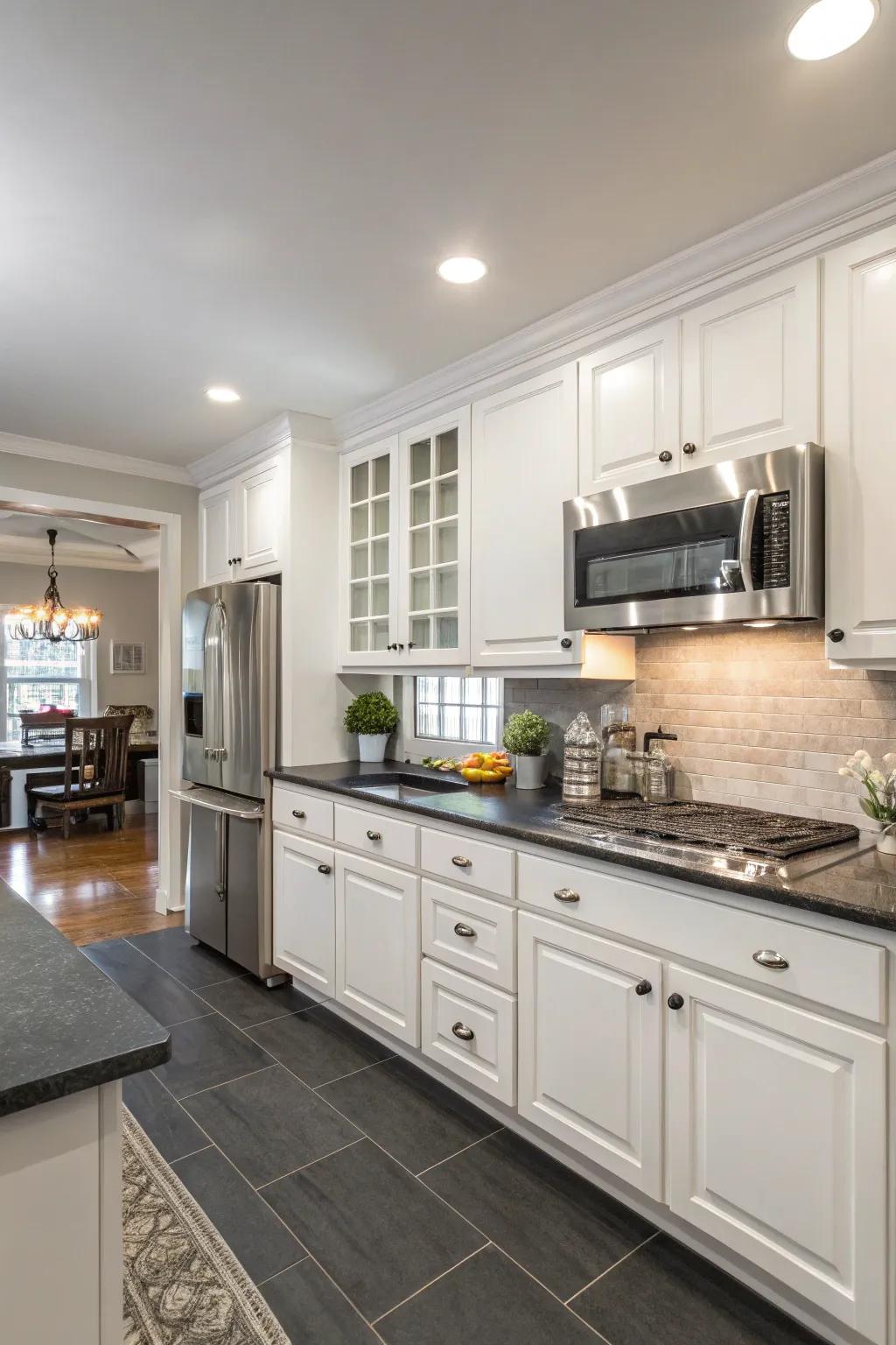 Contrast is key in this kitchen with white cabinets and gray countertops.