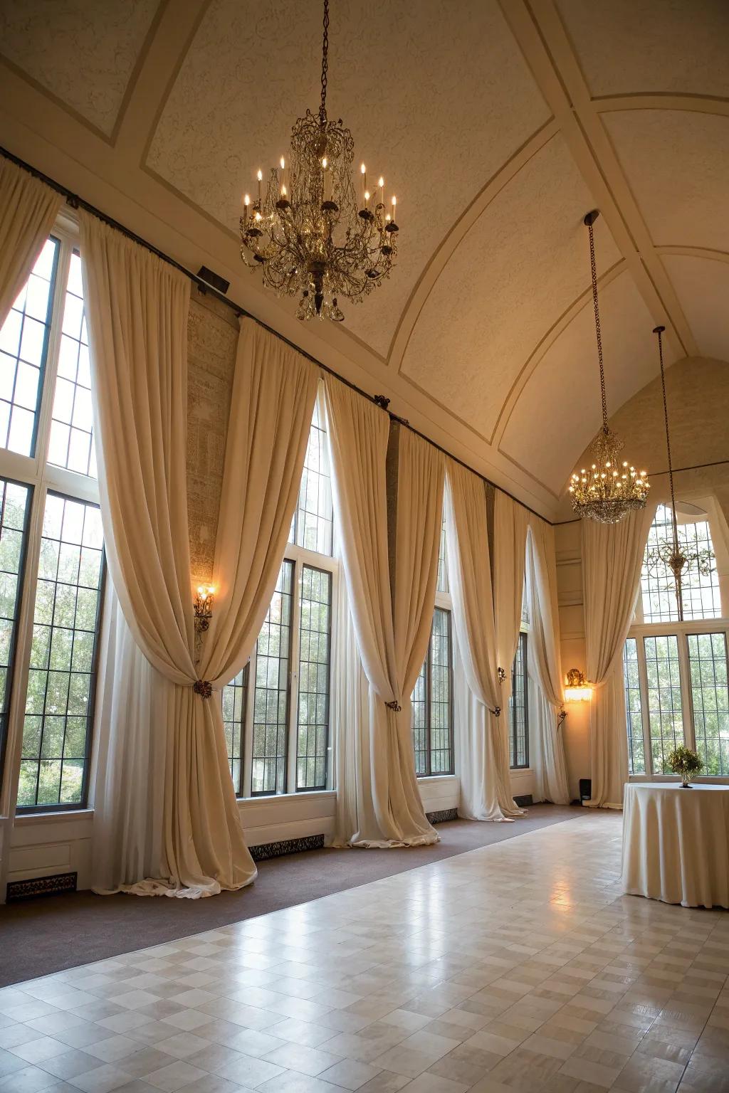 Daring drapes stress the apex and grace of the space.