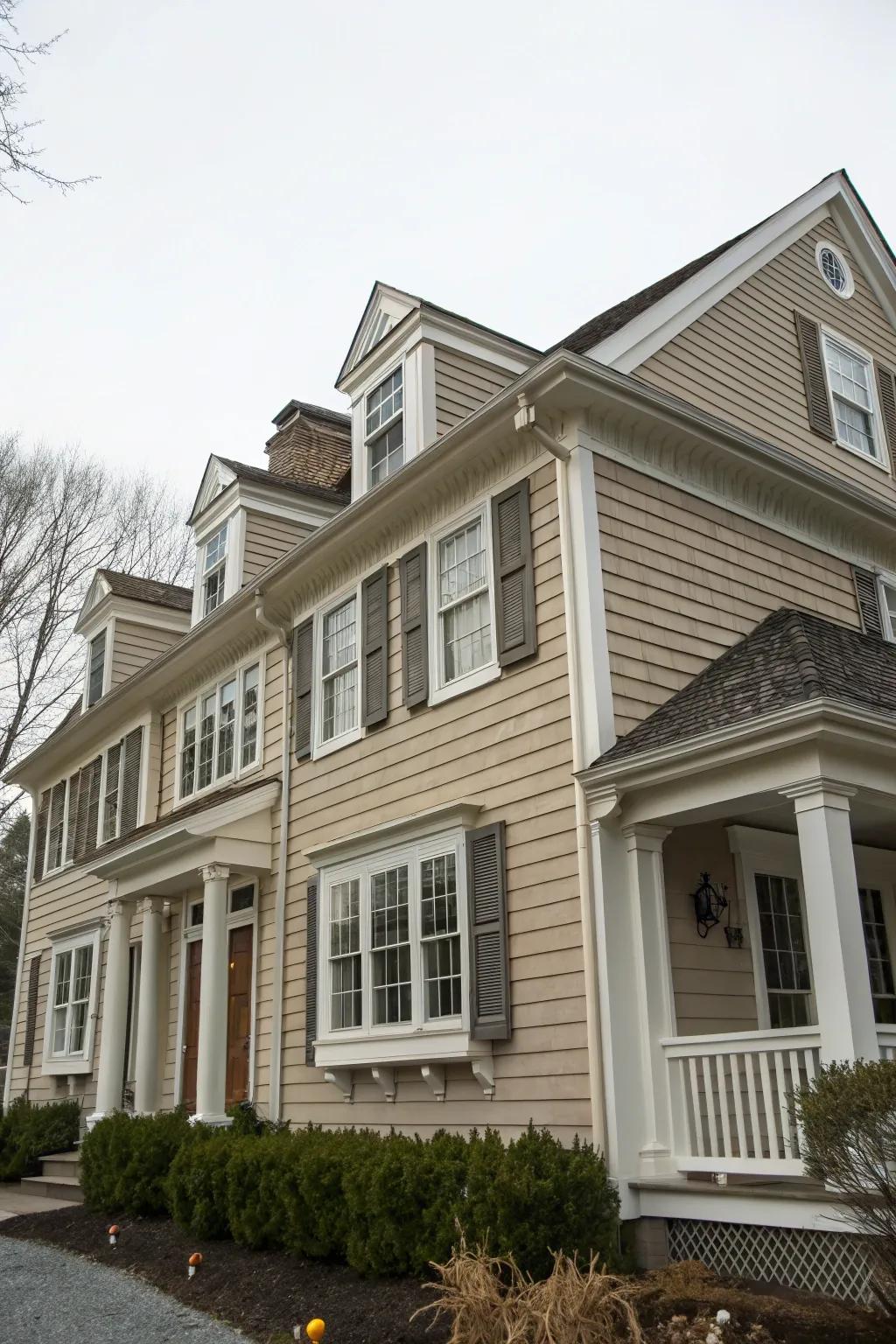 Colonial house with taupe and beige tones.