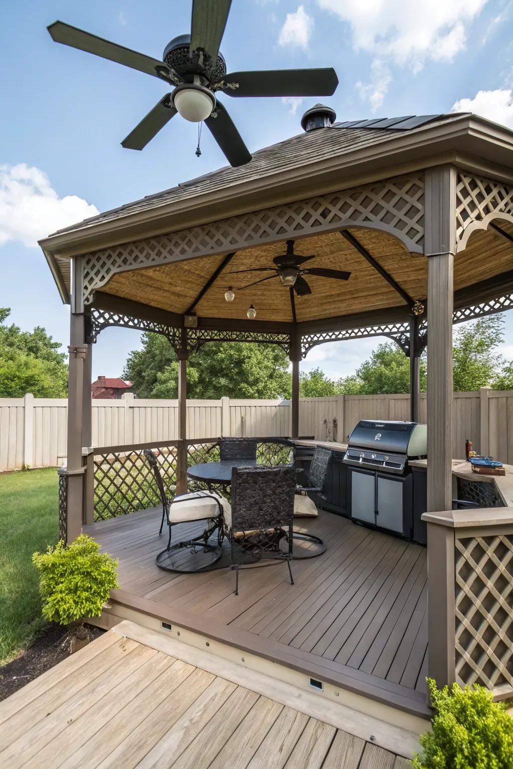 A gazebo with ceiling fans ensuring a cool, comfortable grilling experience.
